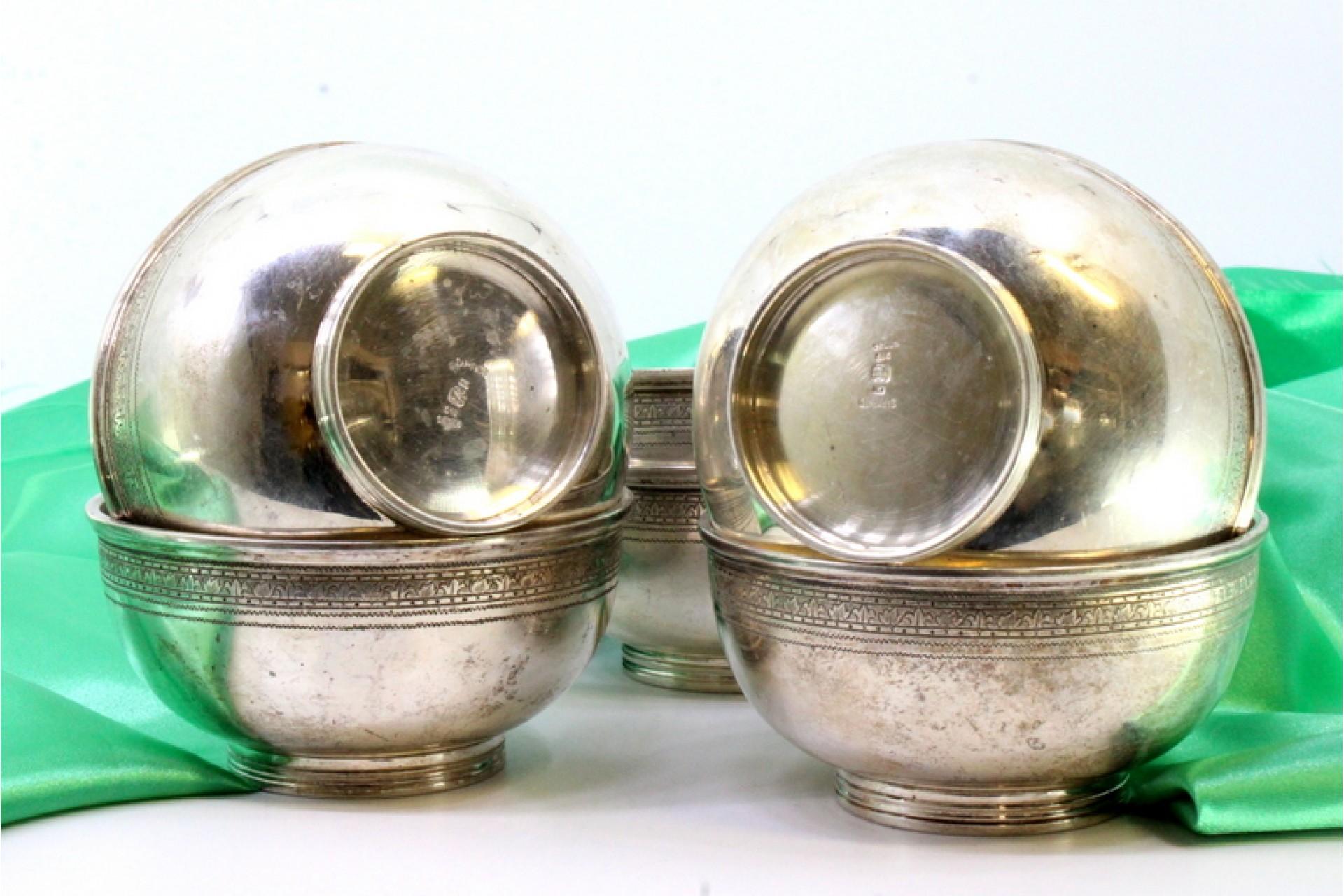 Description: Set of six silver washbasins with engraved friezes on the surroundings. Metal: Silver. Origin: Portuguese. Mark: standing eagle - I Title. Weight: 895.65 grams (Set of six washbasins). Dimensions: 9.8cmx5cm. Content: 916/1000. Assay