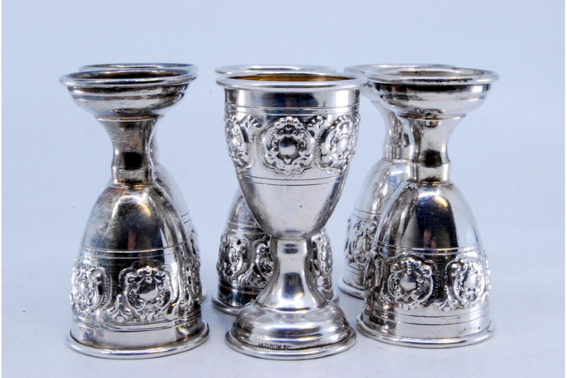 European Set of six small silver goblets with reliefs and a smooth base For Sale