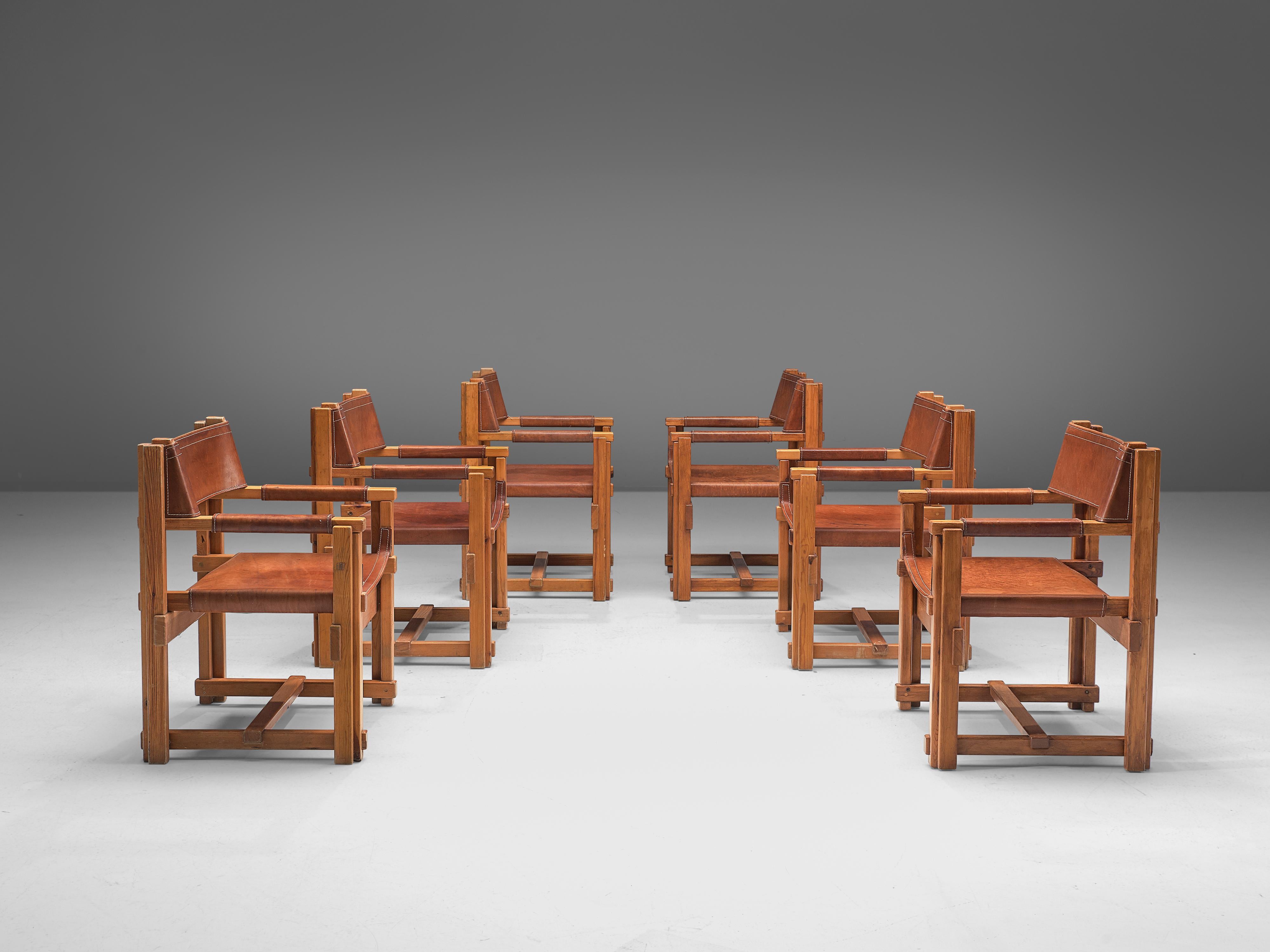 Joan Pou, set of six armchairs, pine and leather, Spain, 1960s

This set of six armchairs from Spain is strict, purist and belongs to the rationalist movement in Spain. The chairs feature an architectural frame, build up from only horizontal and