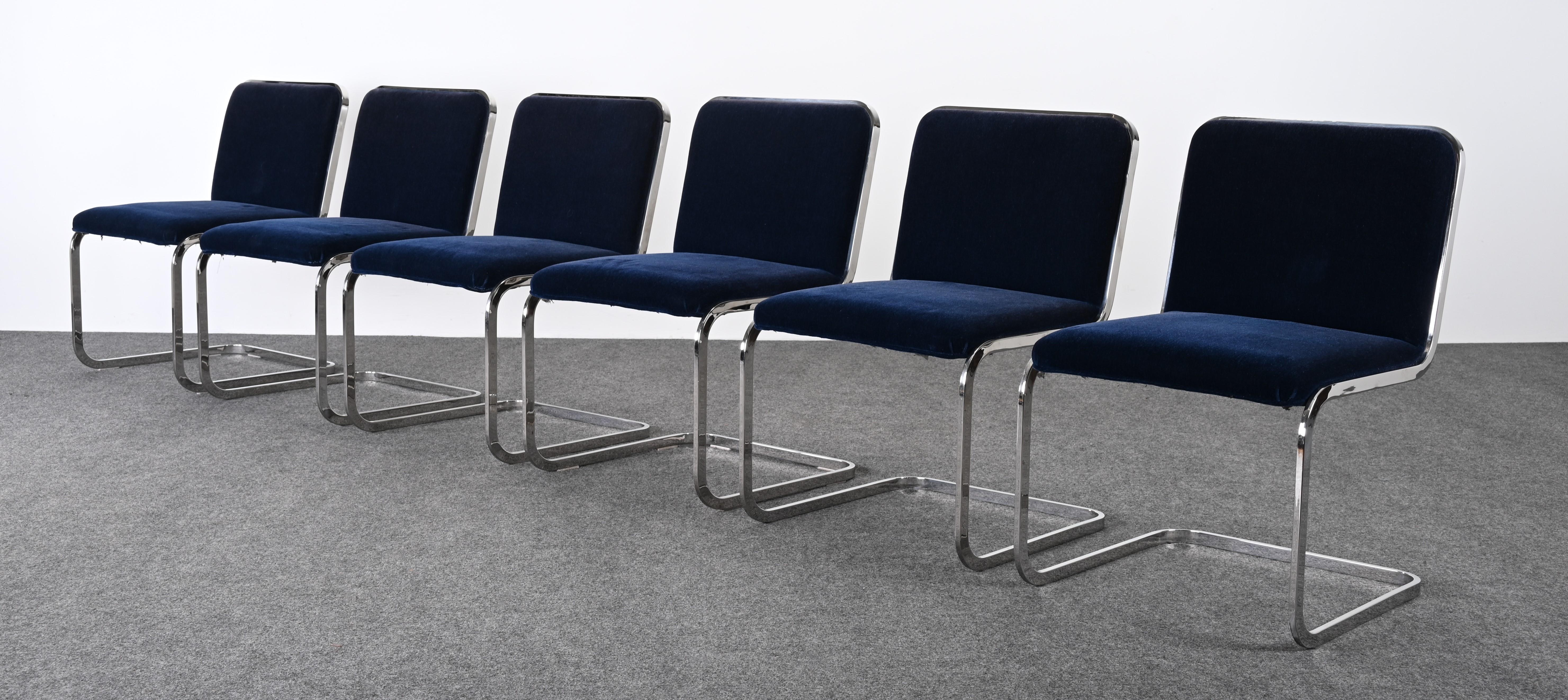 A stunning set of six dining chairs by Brueton, circa 1980s. The cantilever chairs are classic Mid-Century Modern design. The dark cobalt blue mohair is in very good condition and the chairs are ready to place. This high-quality set has the look of
