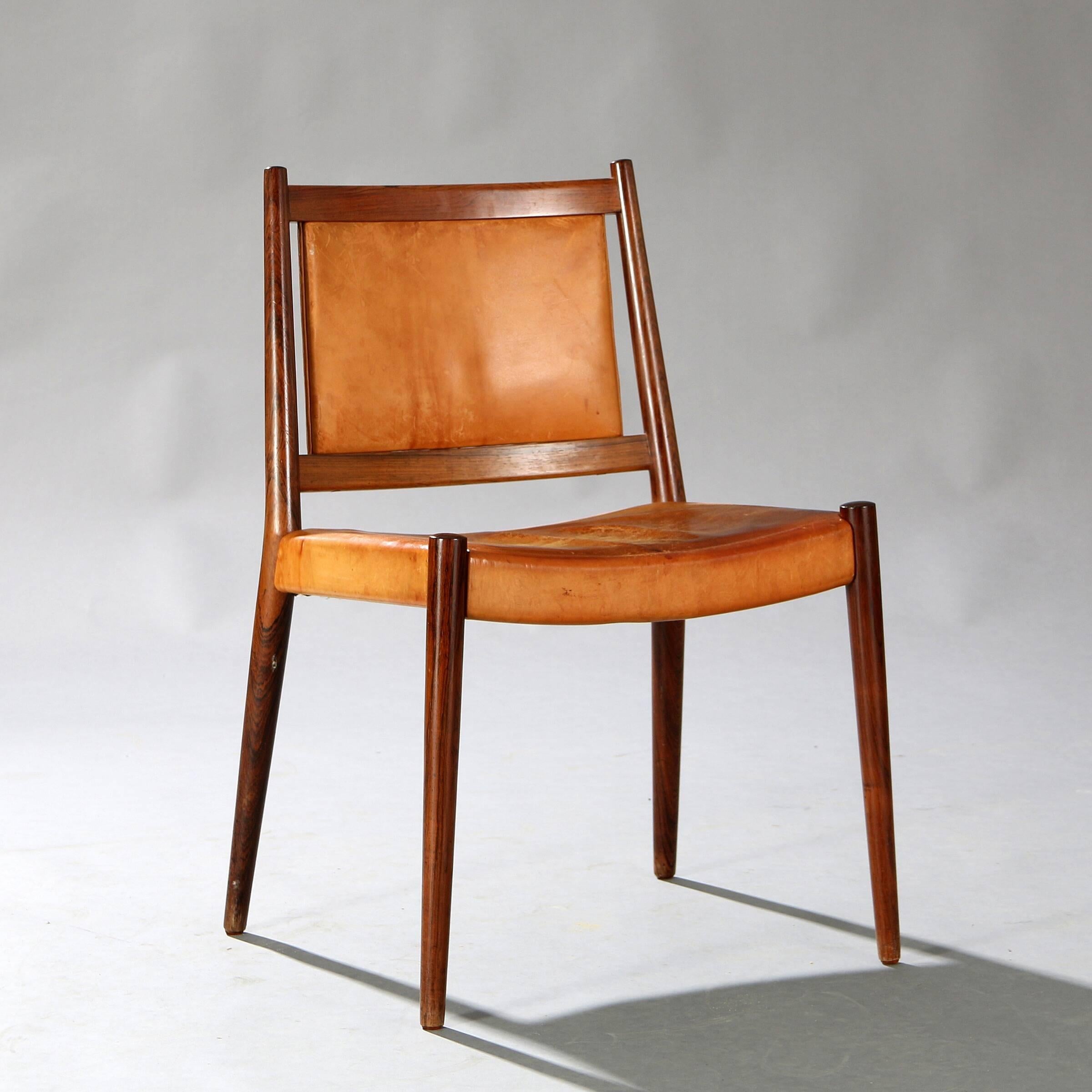 This set of six rosewood dining chairs were designed by Steffen Syrach Larsen and presented by Gustav Bertelsen at The Copenhagen Cabinetmakers' Guild Exhibition at Designmuseum Danmark, 1960. Literature: Grete Jalk [ed.]: “40 Years of Danish