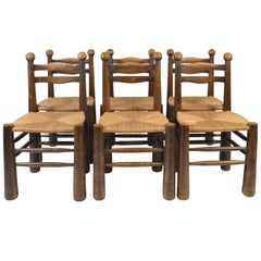 Set of Six Straw Seat and Oak Dining Chairs in the Style of Jean Royère