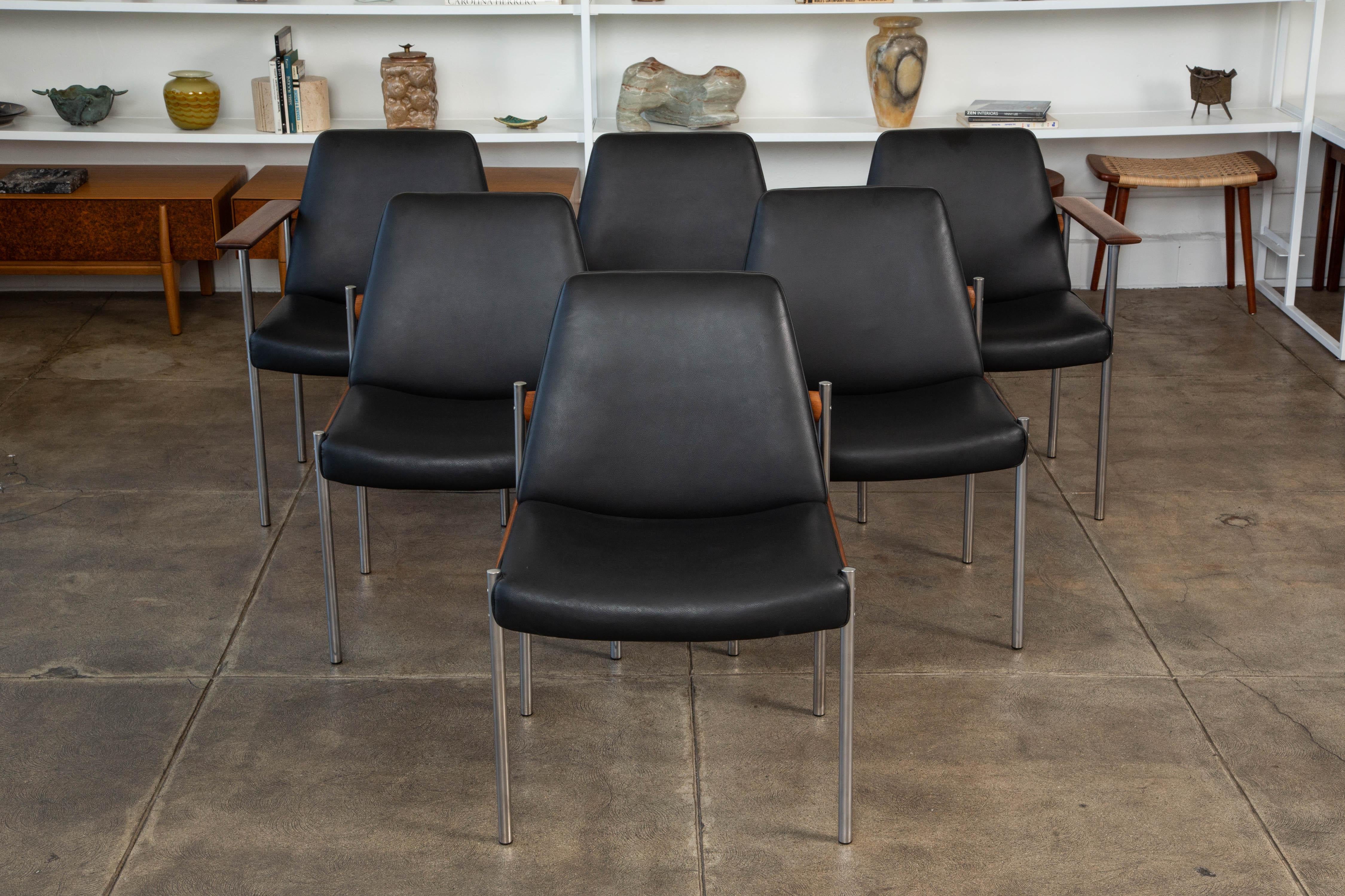 This is the third iteration or “3001” series of Dysthe’s popular conference group for Dokka Møbler of Oslo, produced from 1960-1961. The set has six matching chairs with a metal frame, teak crossbars and leather seat and backrest. Includes two