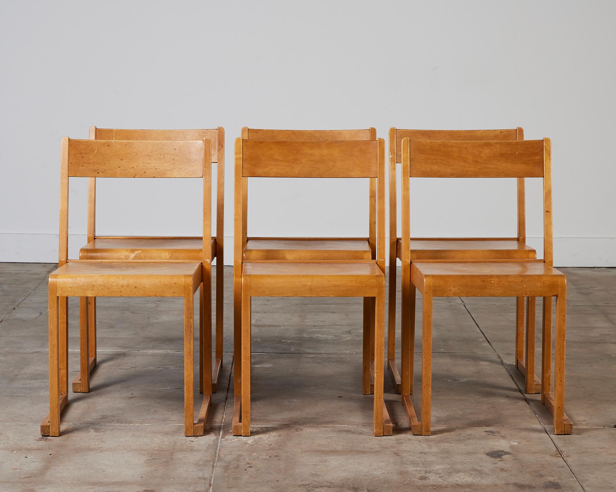 Set of six chairs by Sven Markelius, Sweden, c.1930s. These chairs feature a minimalist modern design, the chair backs are composed of hardwood birch while the seat is made up of bent plywood. The chairs were originally designed for the Helsingborg