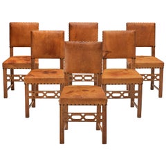 Set of Six Swedish Dining Chairs in Oak and Patinated Cognac Leather
