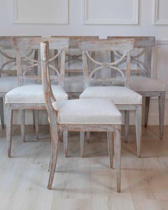 Set of Six Swedish Neoclassical Dining Chairs with Curule Backrests