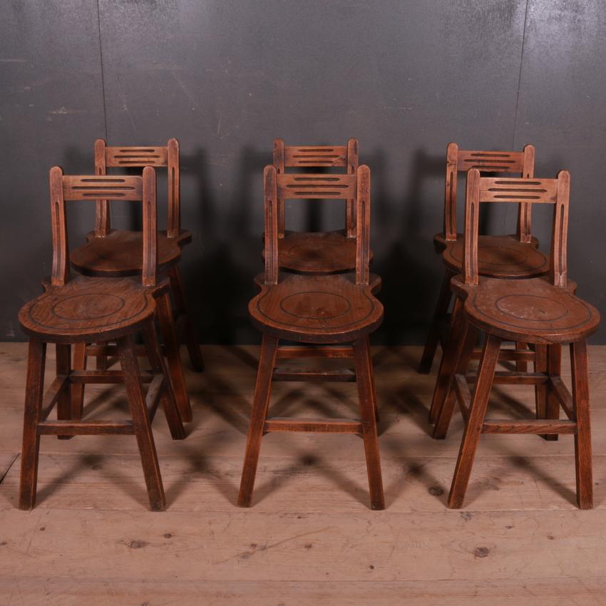 Interesting set of six Swiss elm back stools. Unusual interlocking design, 1880.

Seat height - 17