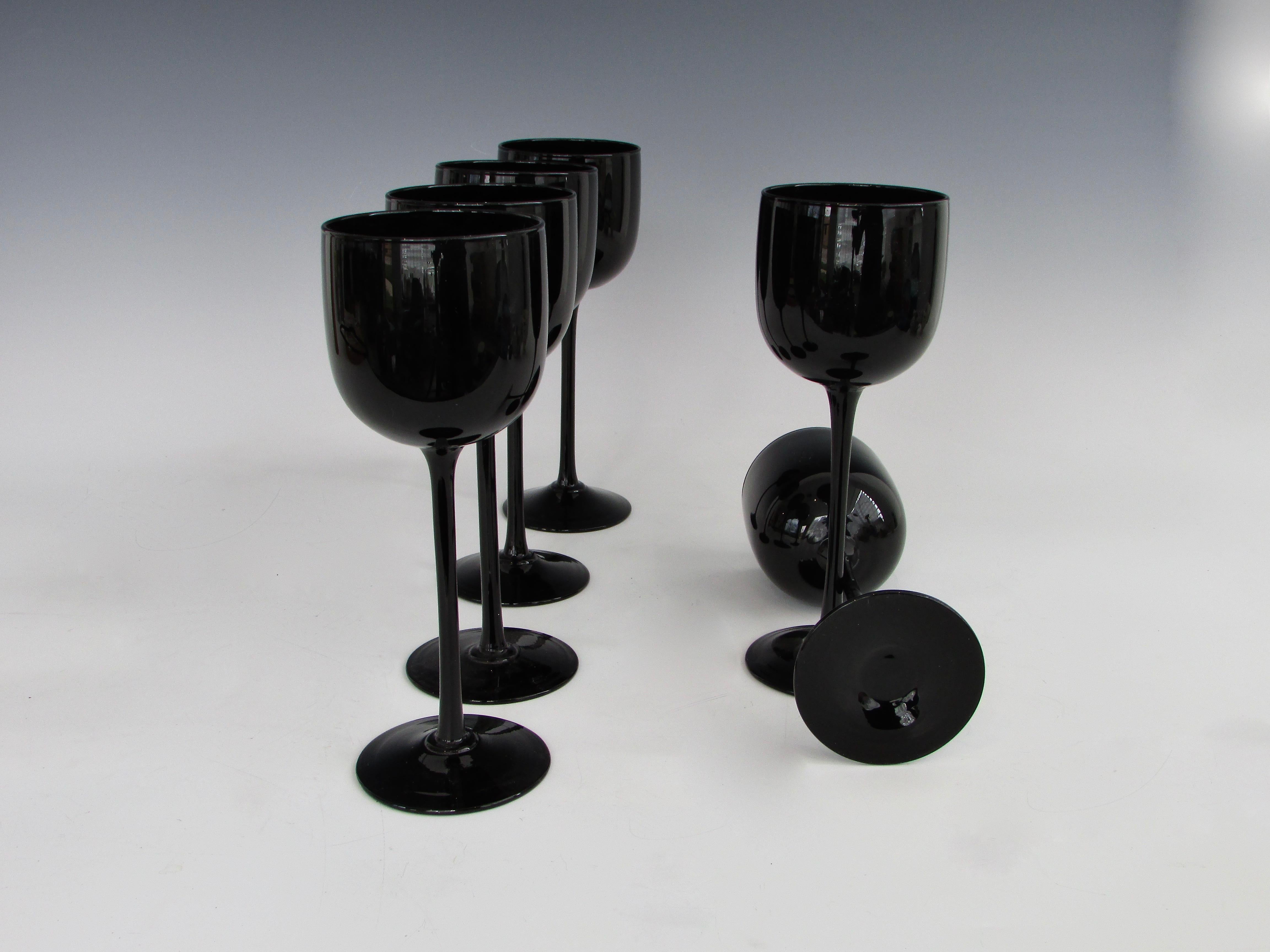 black stemmed wine glasses