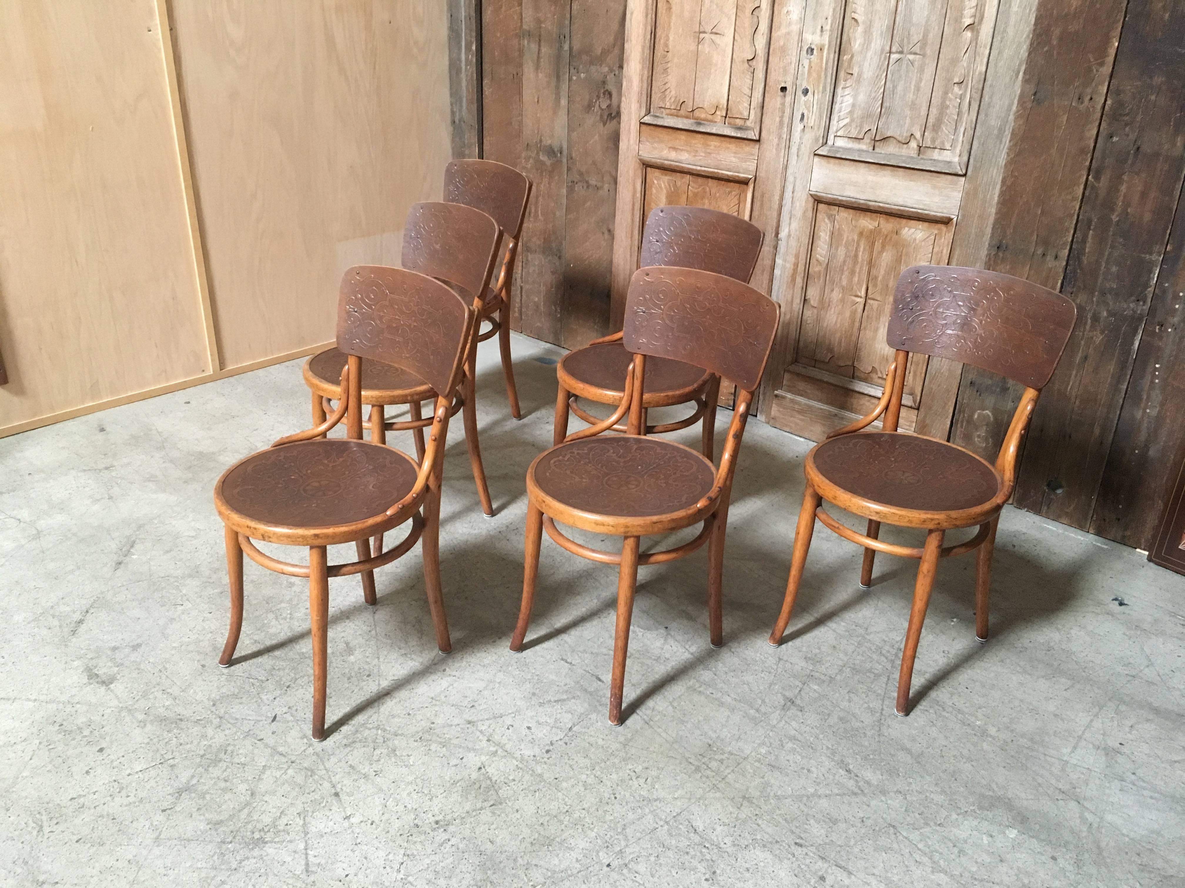 This a great set of chairs with the embossed wood seat and backrest from the famed Thonet plant in Vienna, Austria.
They look fantastic in the two-tone finish with great patina.