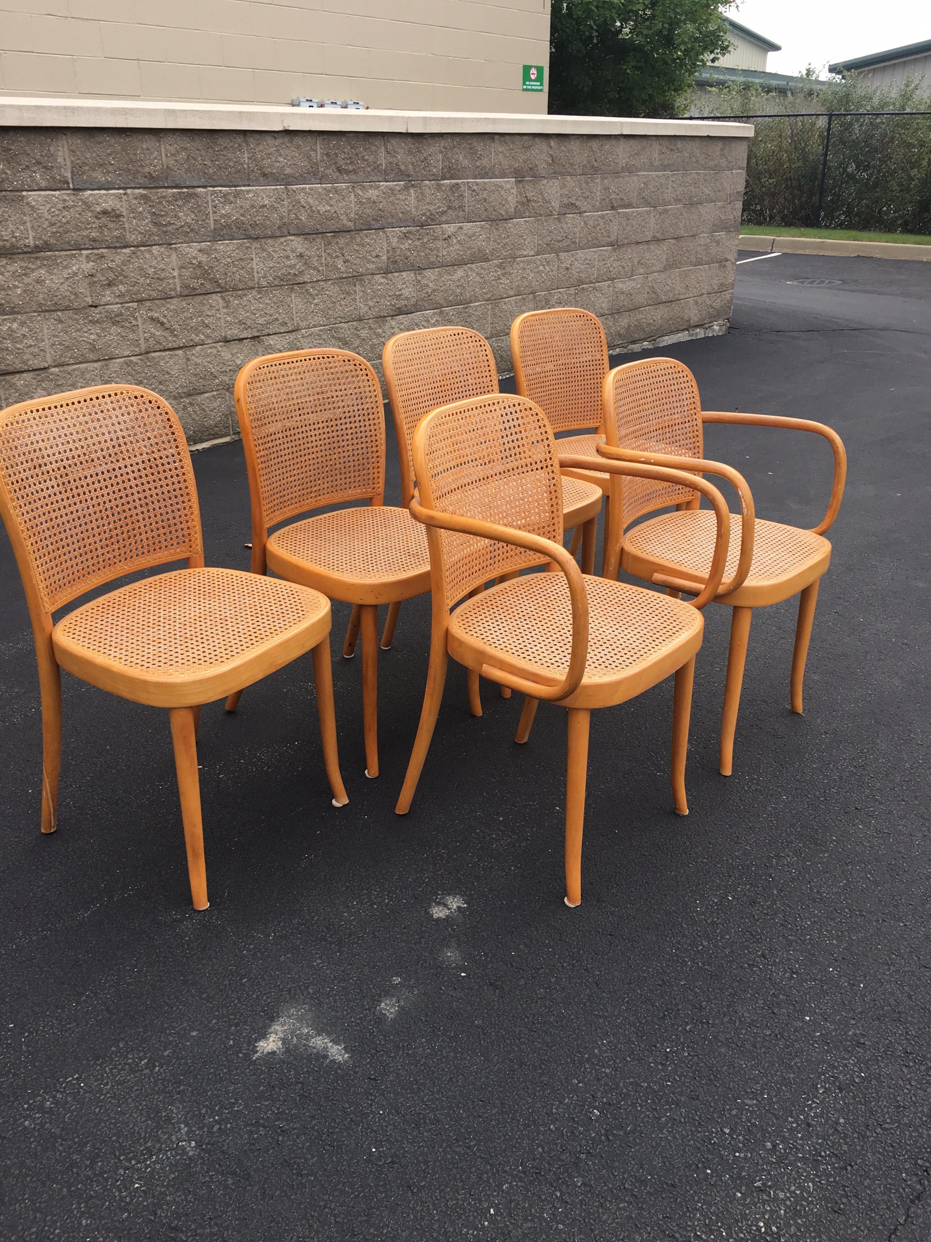 This set of six chairs (4 side and 2 arm chairs), were produced in Italy by Salvatore Leone in the early 20th century. They are made from stained bentwood with caned seats and backs. An exquisite example of fine Italian Craftsmanship very much in