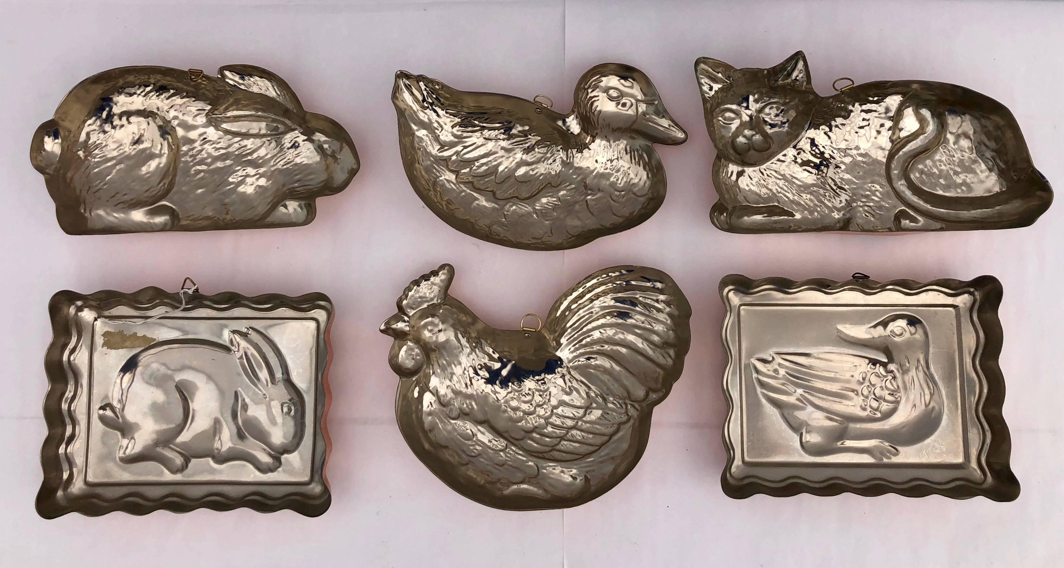 Unknown Set of Six Tin Molds with Copper in the Shape of Rabbits, Cat, Ducks and Chicken