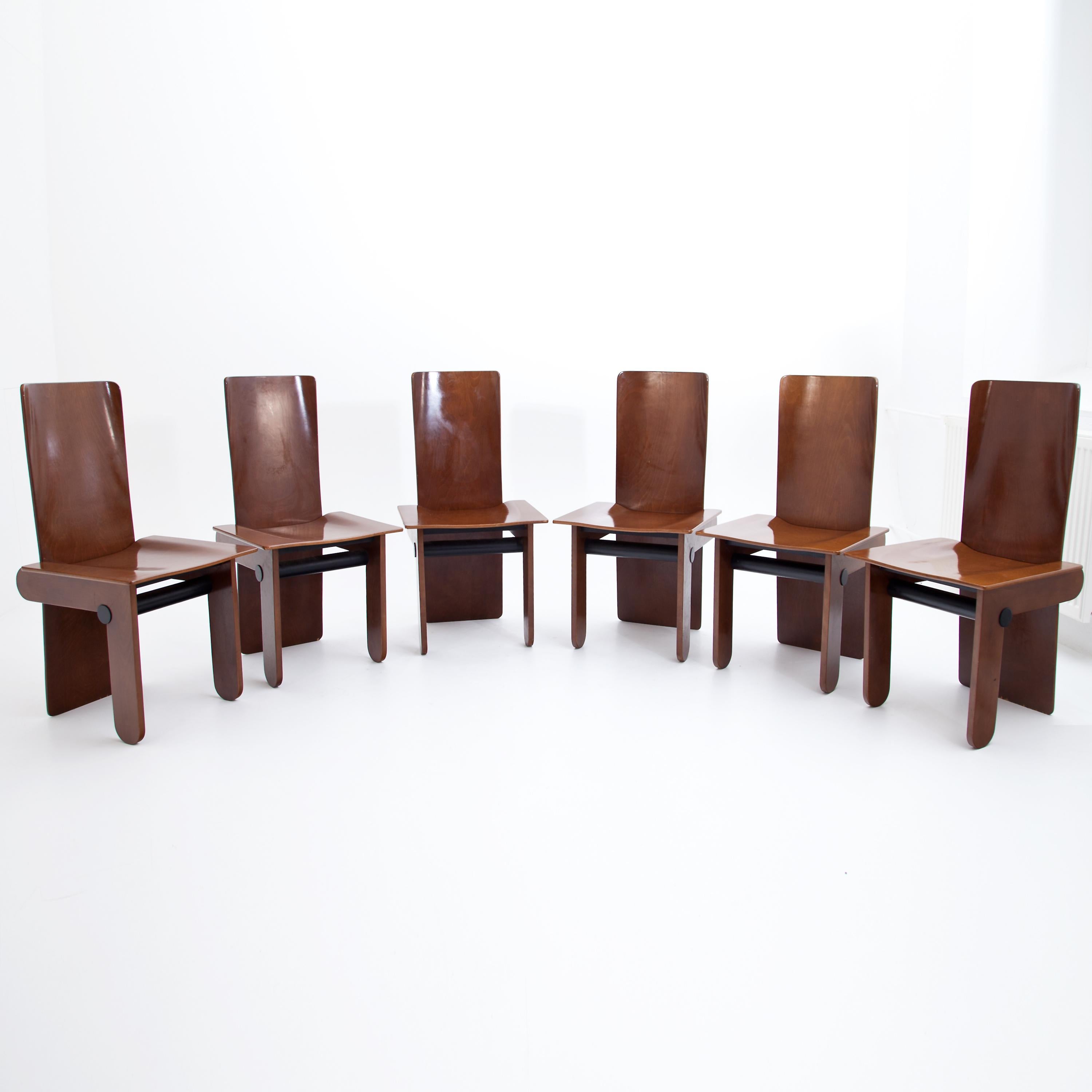 Set of six chairs made of dark stained and ebonized wood in a geometrically constructed design. The chairs were designed by Tobia Scarpa for Gavina in the 1970s. Very good refurbished condition.