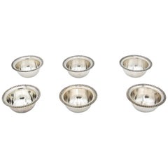 Set of six toilets with relief on the edges