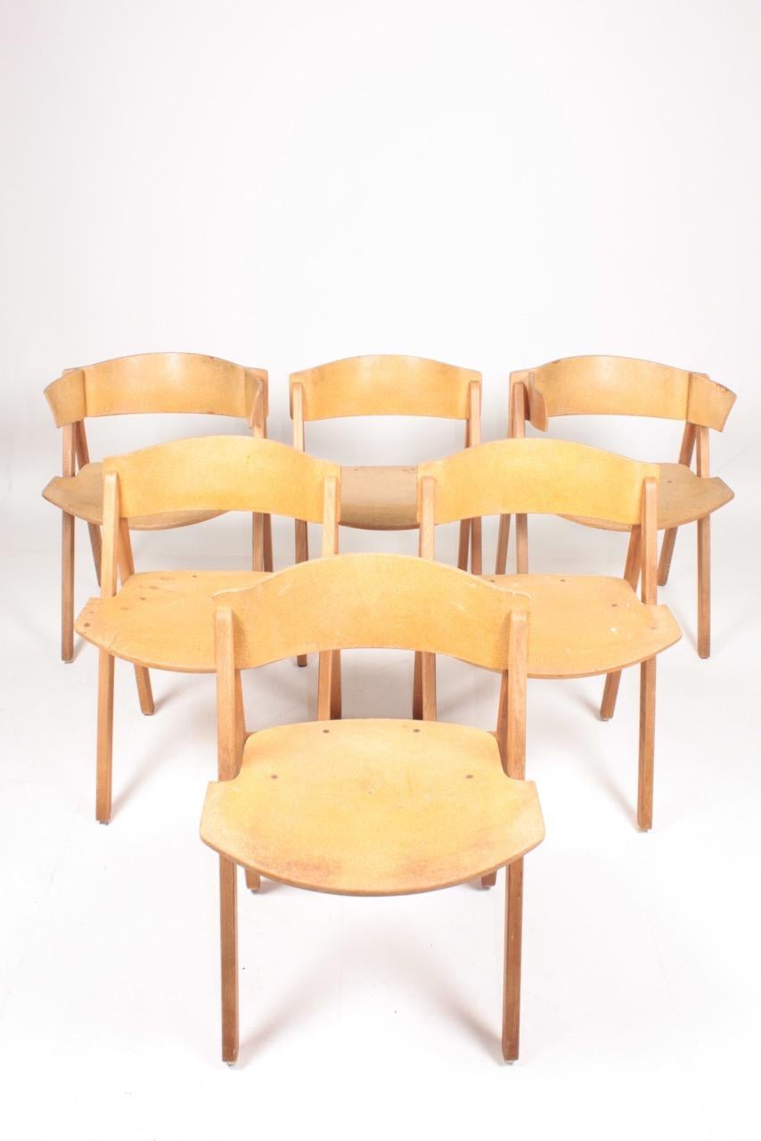 Set of six side chairs in ash tree and cork. Designed by Bernt Petersen. Original condition, 1970s.