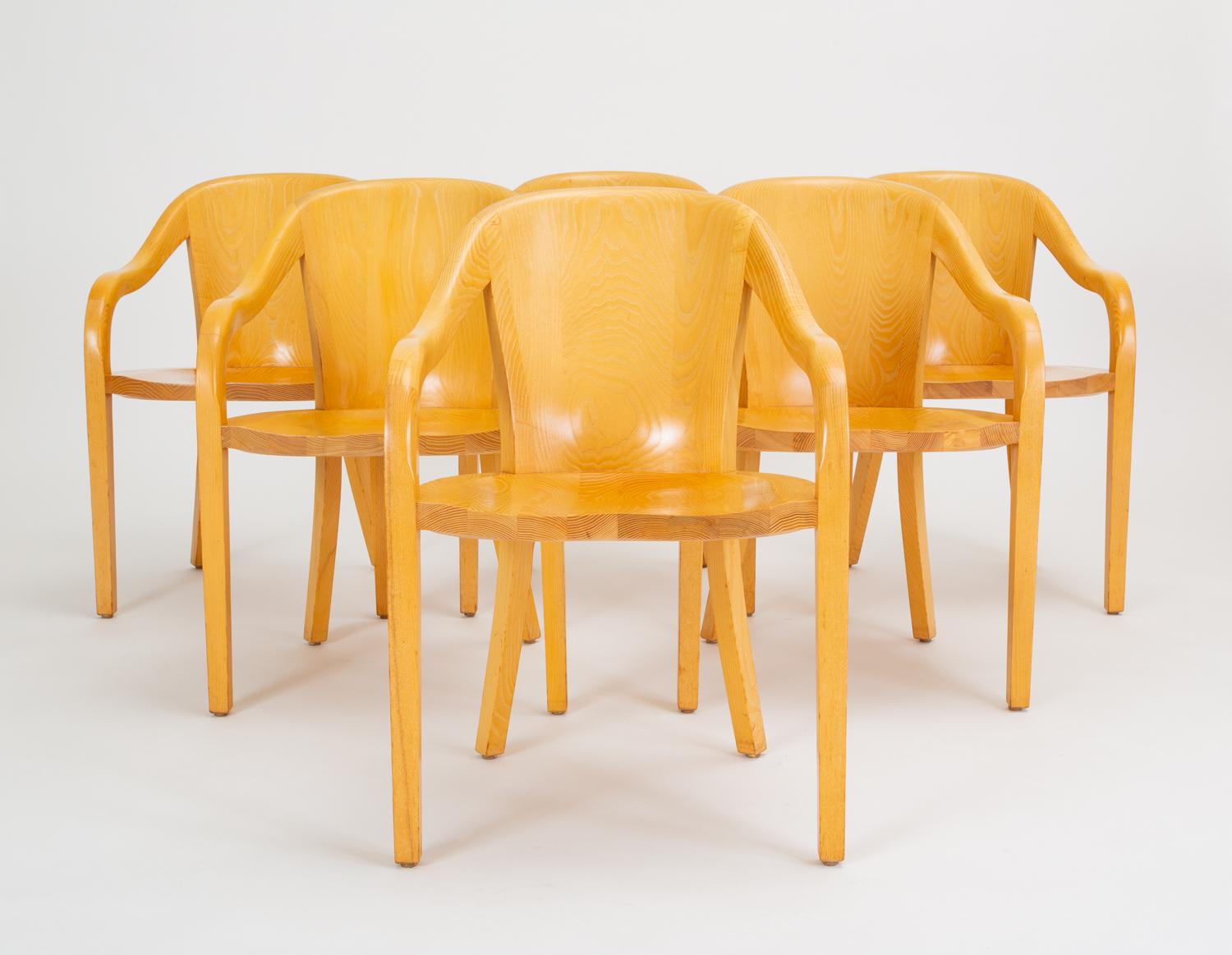 Designed in 1971 for the Lyndon Johnson Presidential Library, Ward Bennett produced these chairs through Brickell Associates in the 1970s and early 1980s. The outwardly simple construction has a frame of solid wood, impeccably joined, with an arched