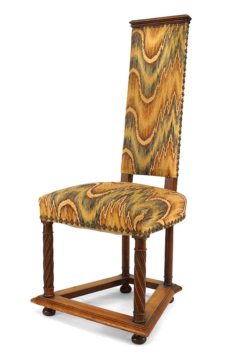 Set of 6 English Arts & Crafts side chairs with upholstered seat and high back with carved swirl design legs connecting by a stretcher.
