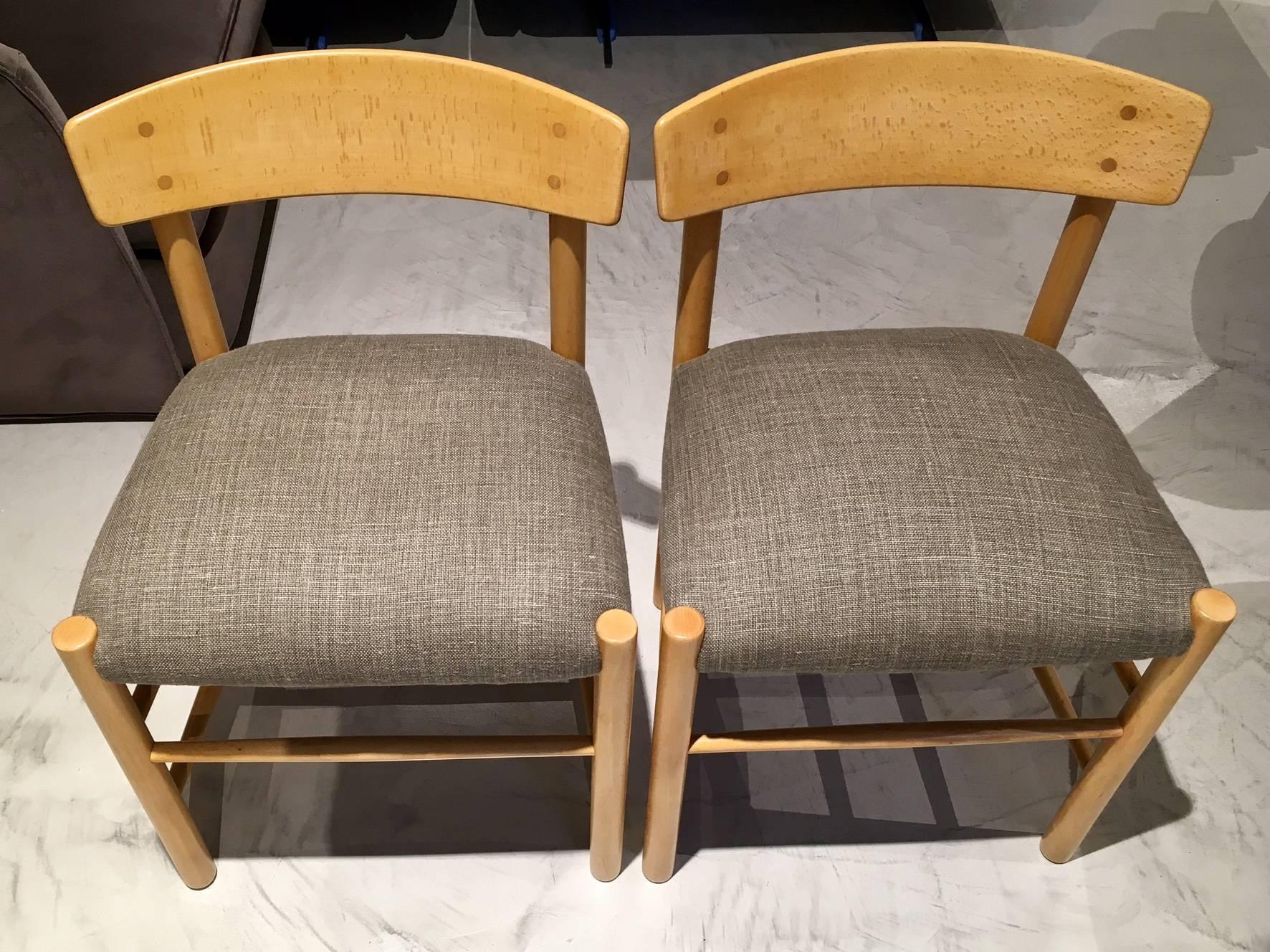 Restored set of six Børge Mogensen J39 Folkestolen, the people's chairs. Designed in 1947. Produced in the 1970s by FDB Møbler. Lacquered beech with seat originally made of paper cord, but now re-upholstered with linen fabric.