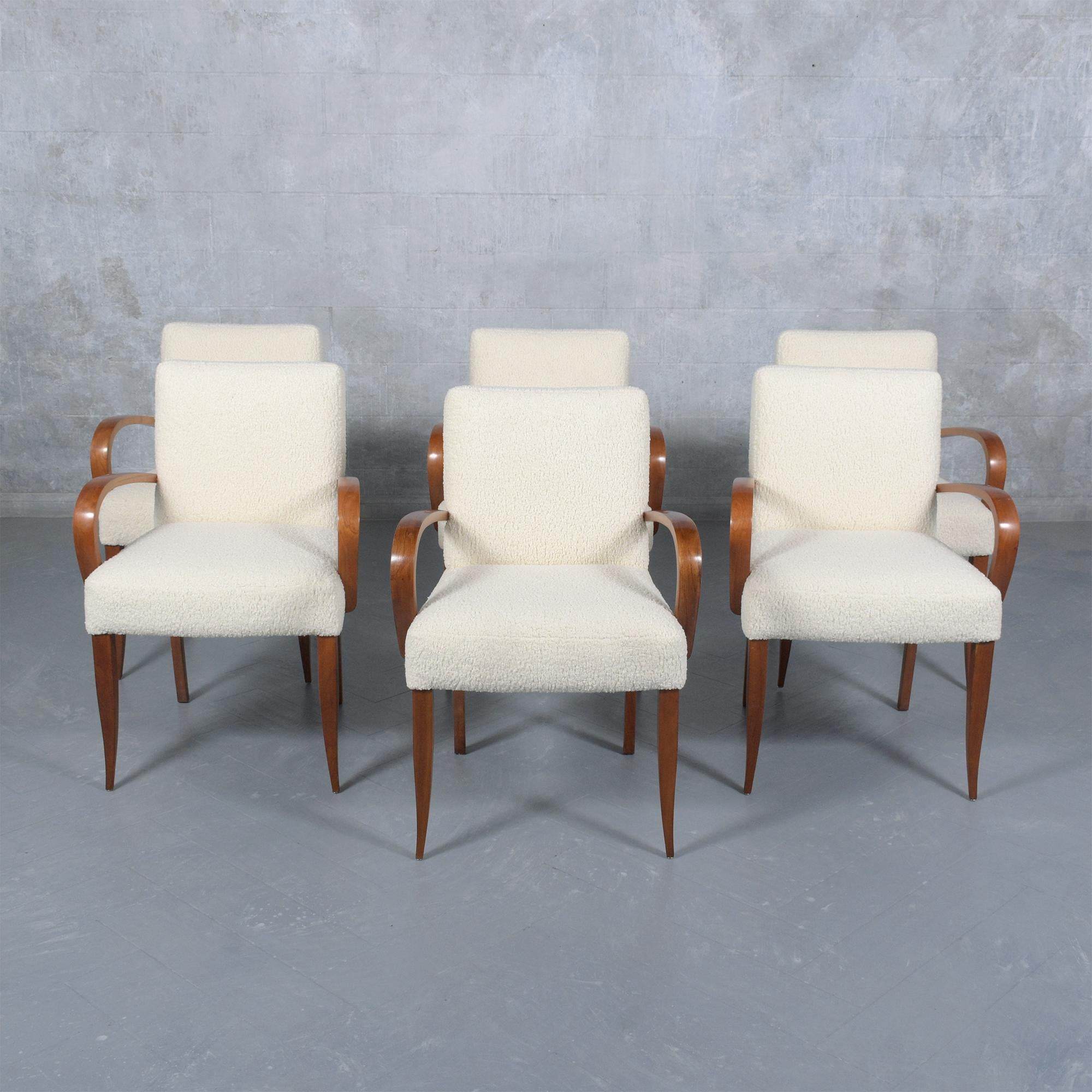 Experience the refined elegance of our set of six mid-century modern dining armchairs, each a showcase of skilled craftsmanship and timeless design. Crafted from premium walnut, these chairs have been meticulously restored by our expert craftsmen,