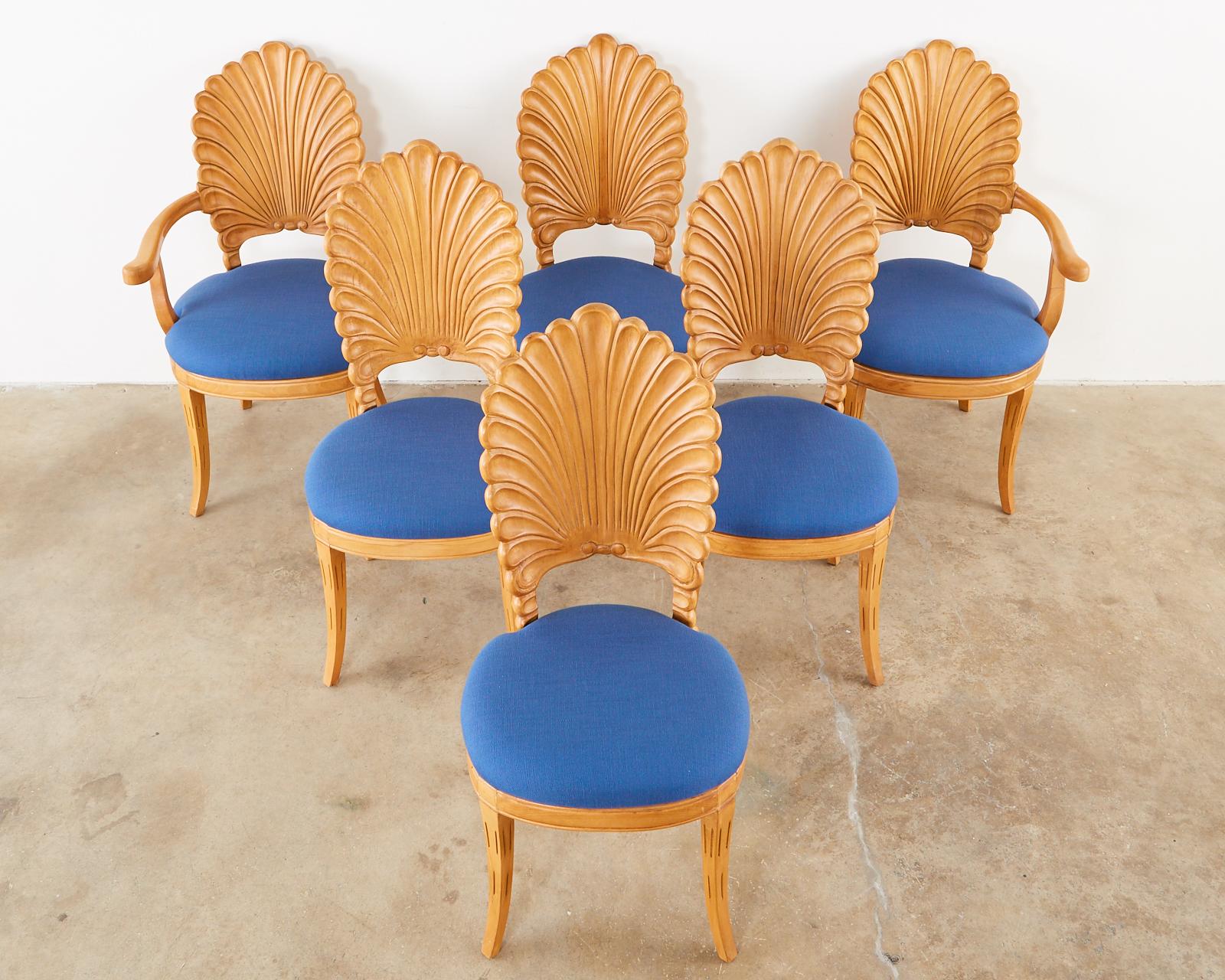 Hollywood regency set of six Italian handcrafted dining chairs featuring a Venetian shell back or scalloped design back. Made in the grotto style the set consists of four side chairs and two armchairs measuring 23 inches deep with a 26 inch arm. The