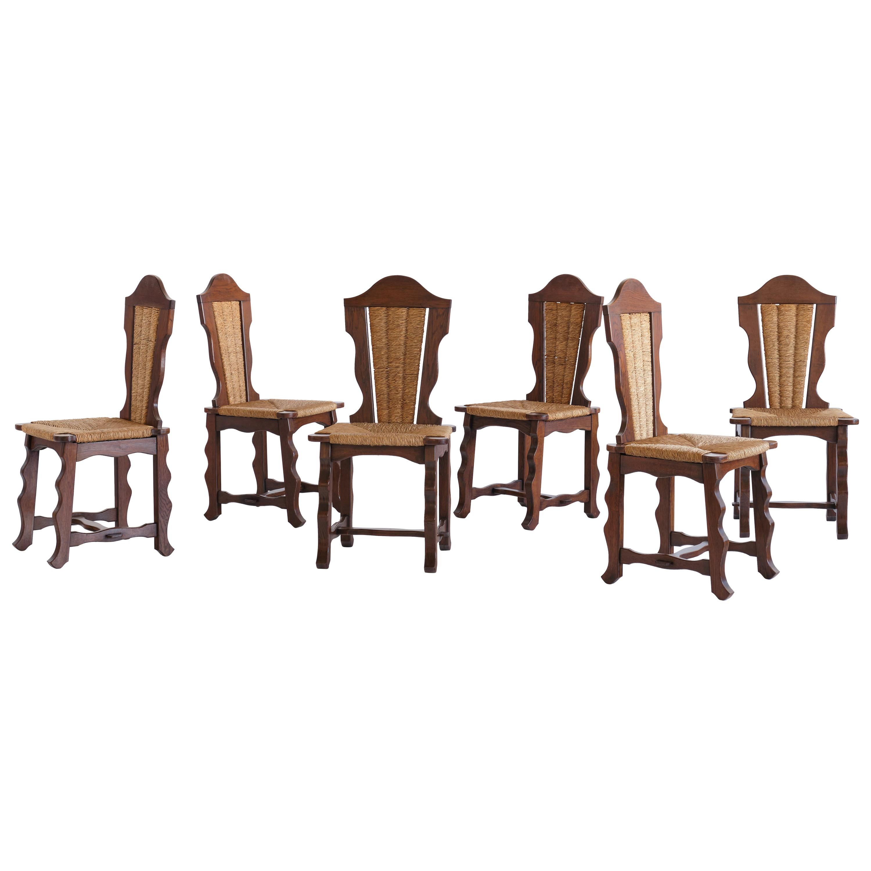 Set of Six Victor Courtray Attributed Dining Chairs in Oak and Rush, 1950s