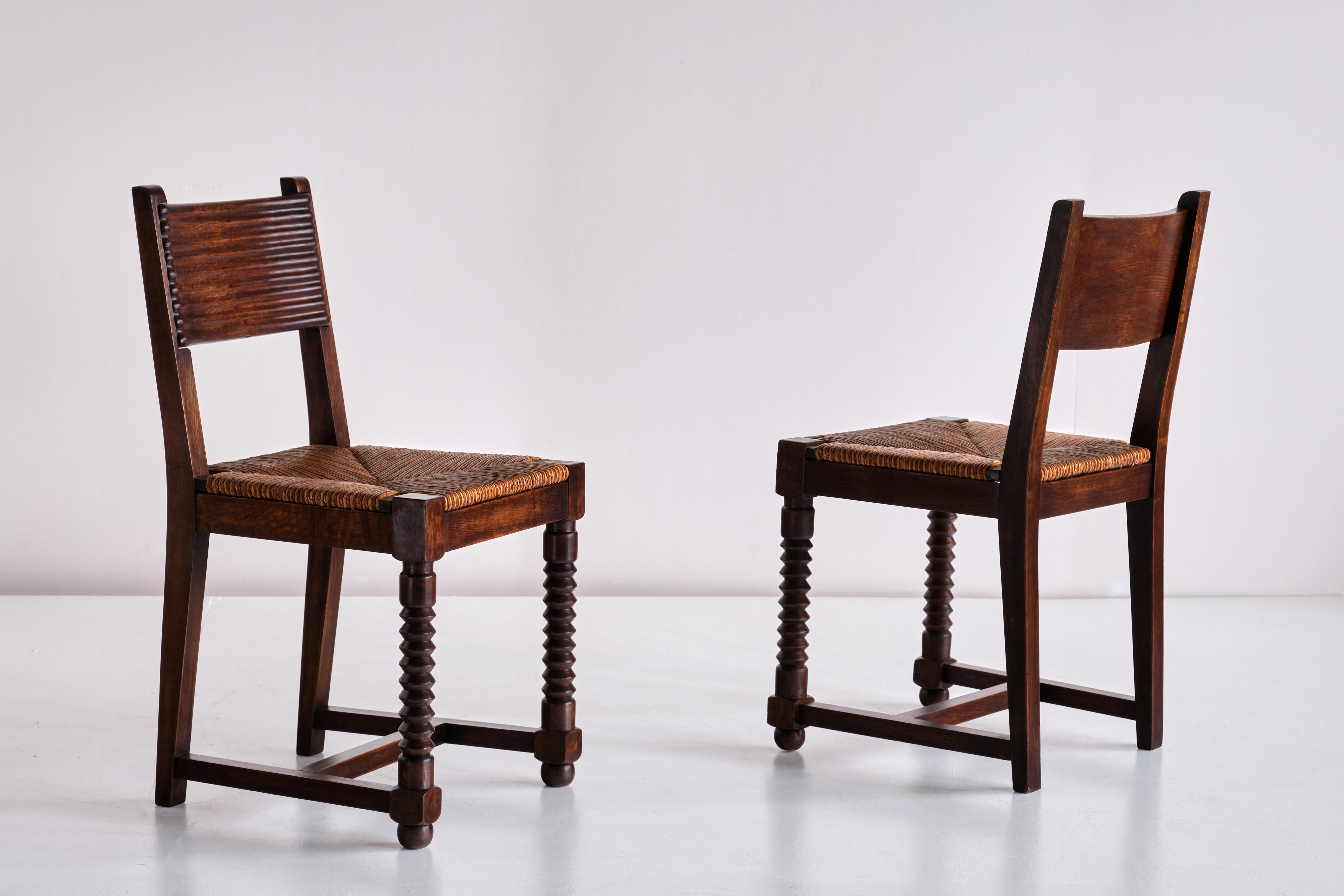 Set of Six Victor Courtray Dining Chairs in Oak and Rush, France, 1940s In Good Condition For Sale In The Hague, NL