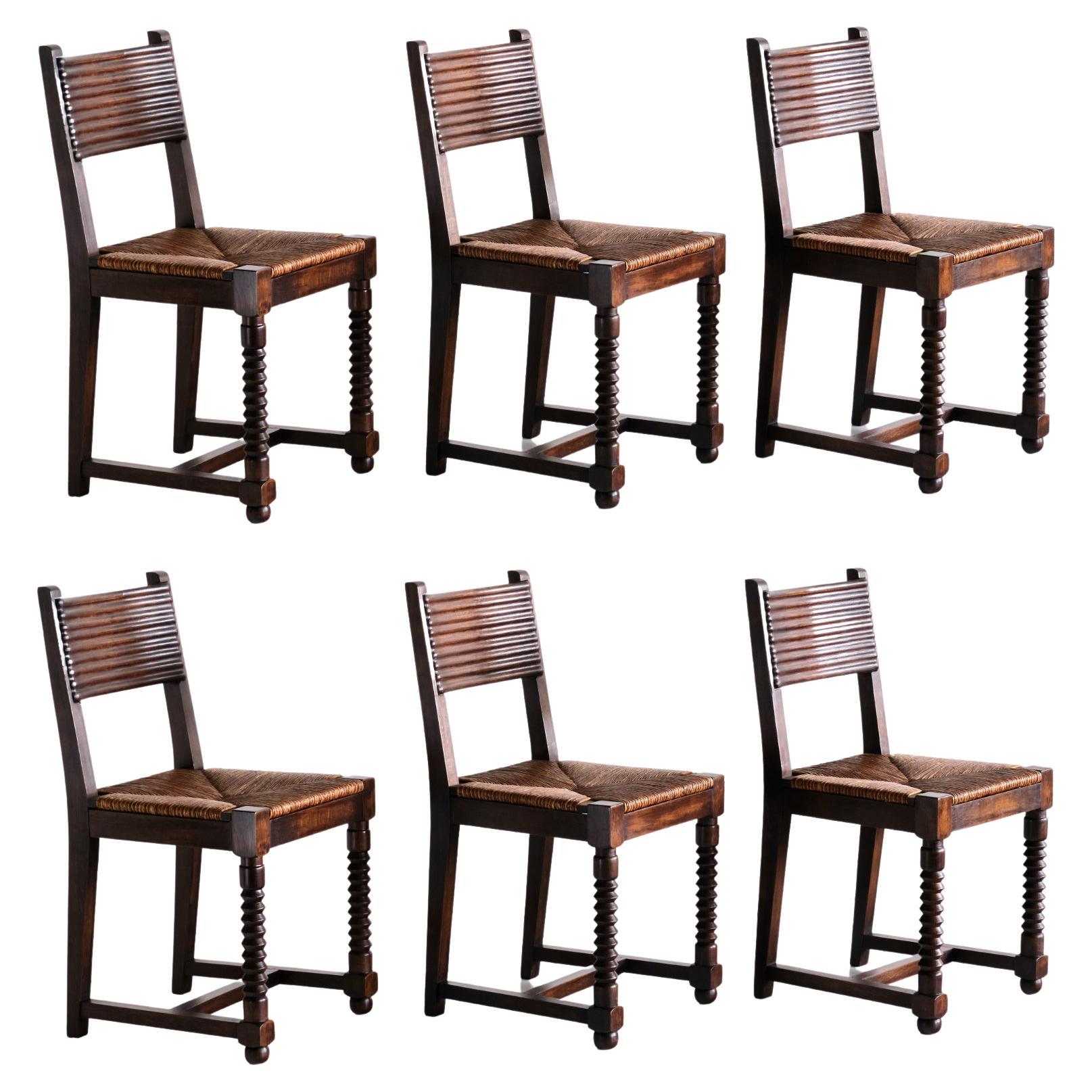 Set of Six Victor Courtray Dining Chairs in Oak and Rush, France, 1940s