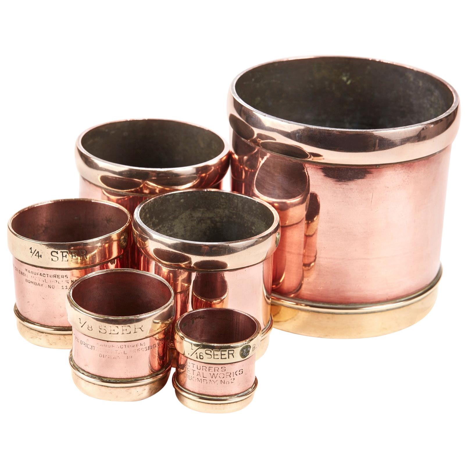 Set of Six Victorian Graduated Copper and Brass Vessels