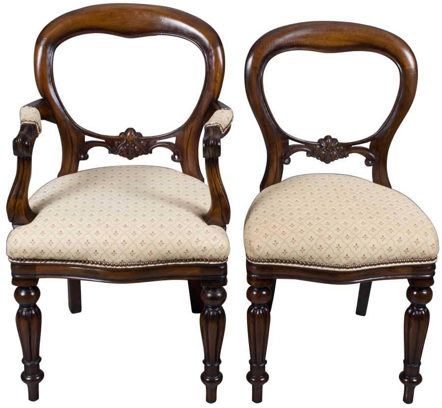 Done in a classic Victorian style, this set of balloon back dining chairs consists of four side chairs and two arms. The remain clean and ready to be used in the home immediately. Whether used on their own or to augment an existing set, they bring