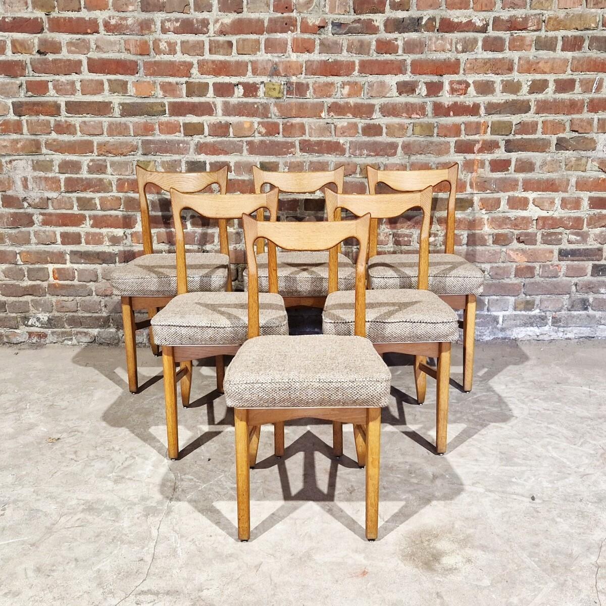 Set of six dining table designed by the famous french duo Guillerme et Chambron in the 1950's.