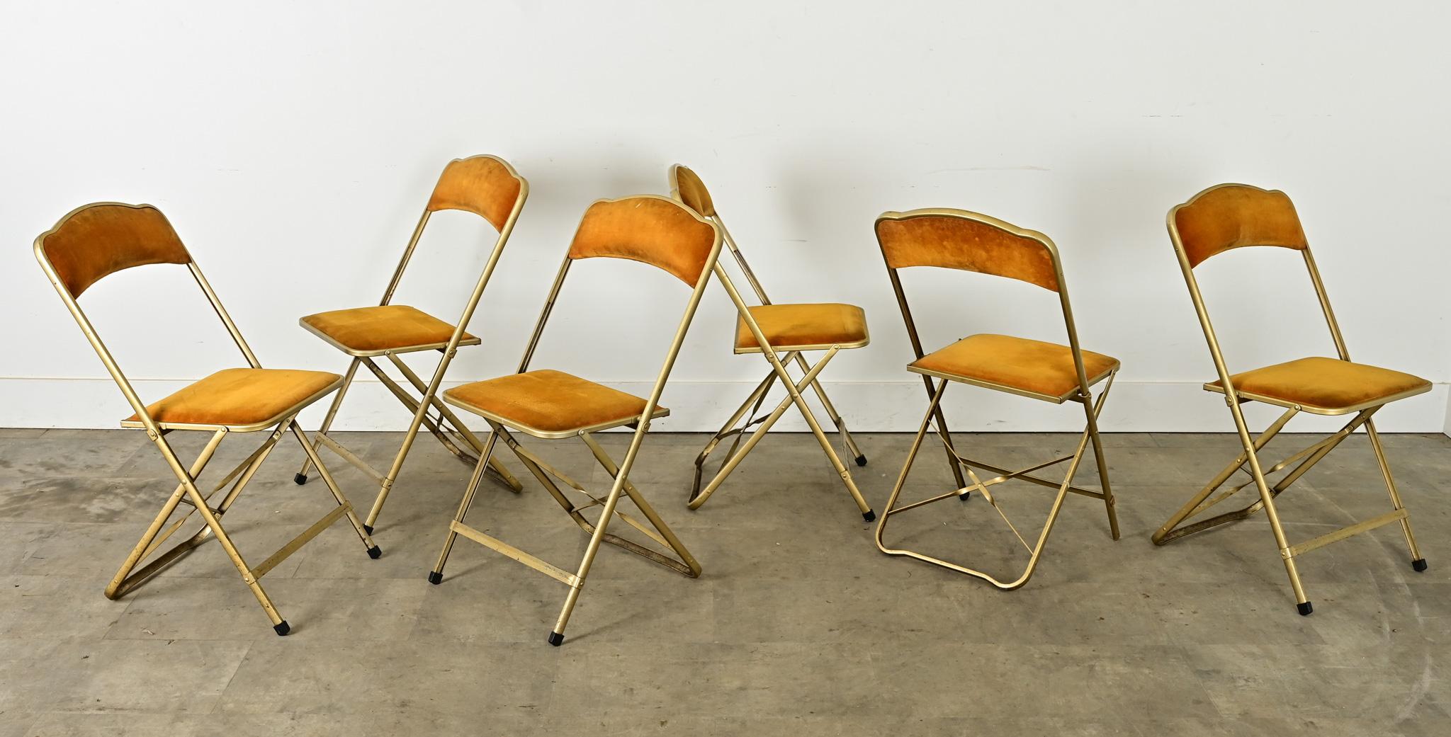 A welcome alternative to unsightly and uncomfortable plastic or metal folding chairs, this vintage French set is upholstered in gorgeous orange velvet and set within brushed-brass frames. Made in the period of Lafuma Chantazur, the French company