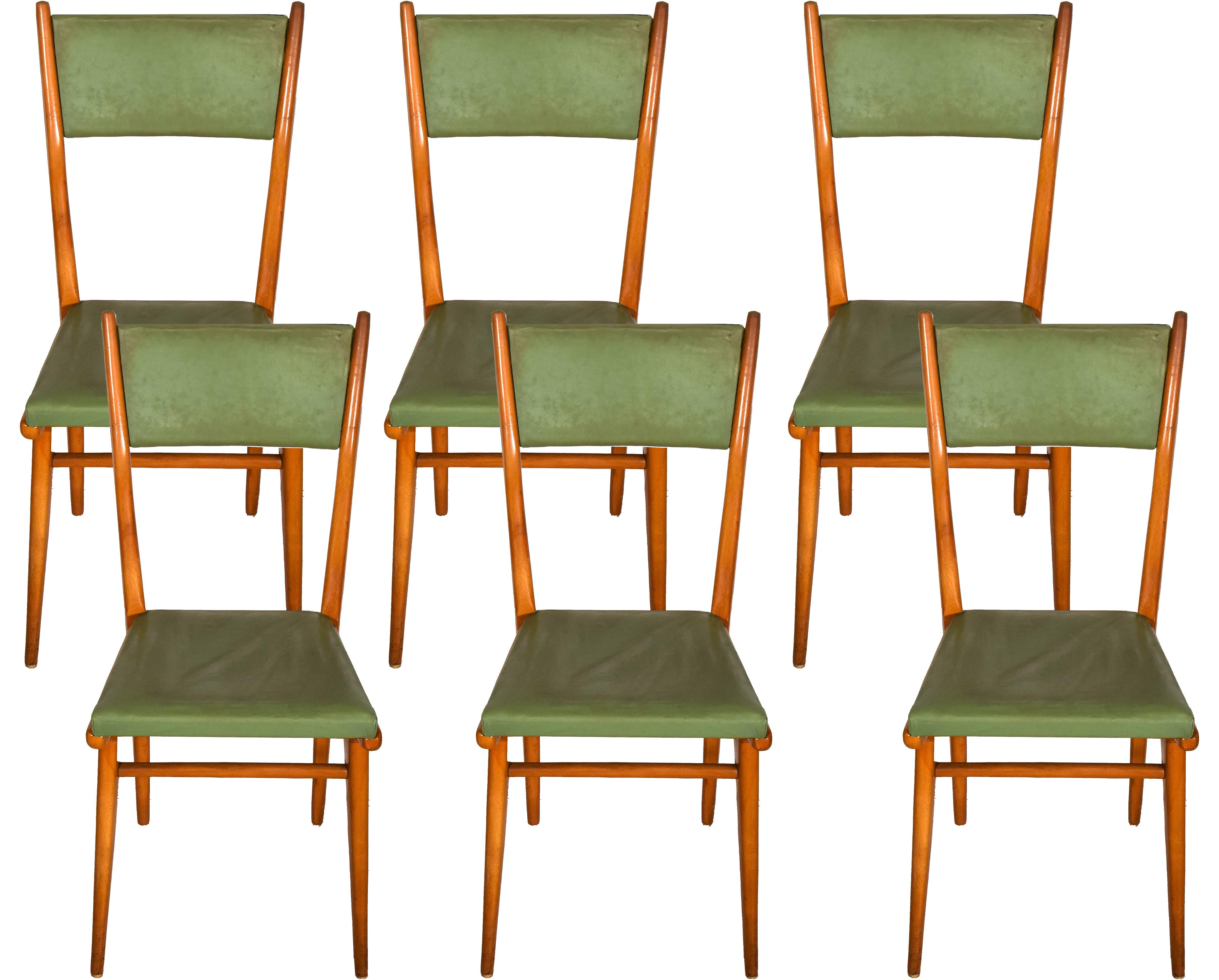 This set of six green chairs is a midcentury design furniture manufactured in Italy in the 1950s.

Beautiful vintage set including six green upholstered chairs.

Every piece is in good conditions except for some minor holes.

Dimensions: cm 44 x 95