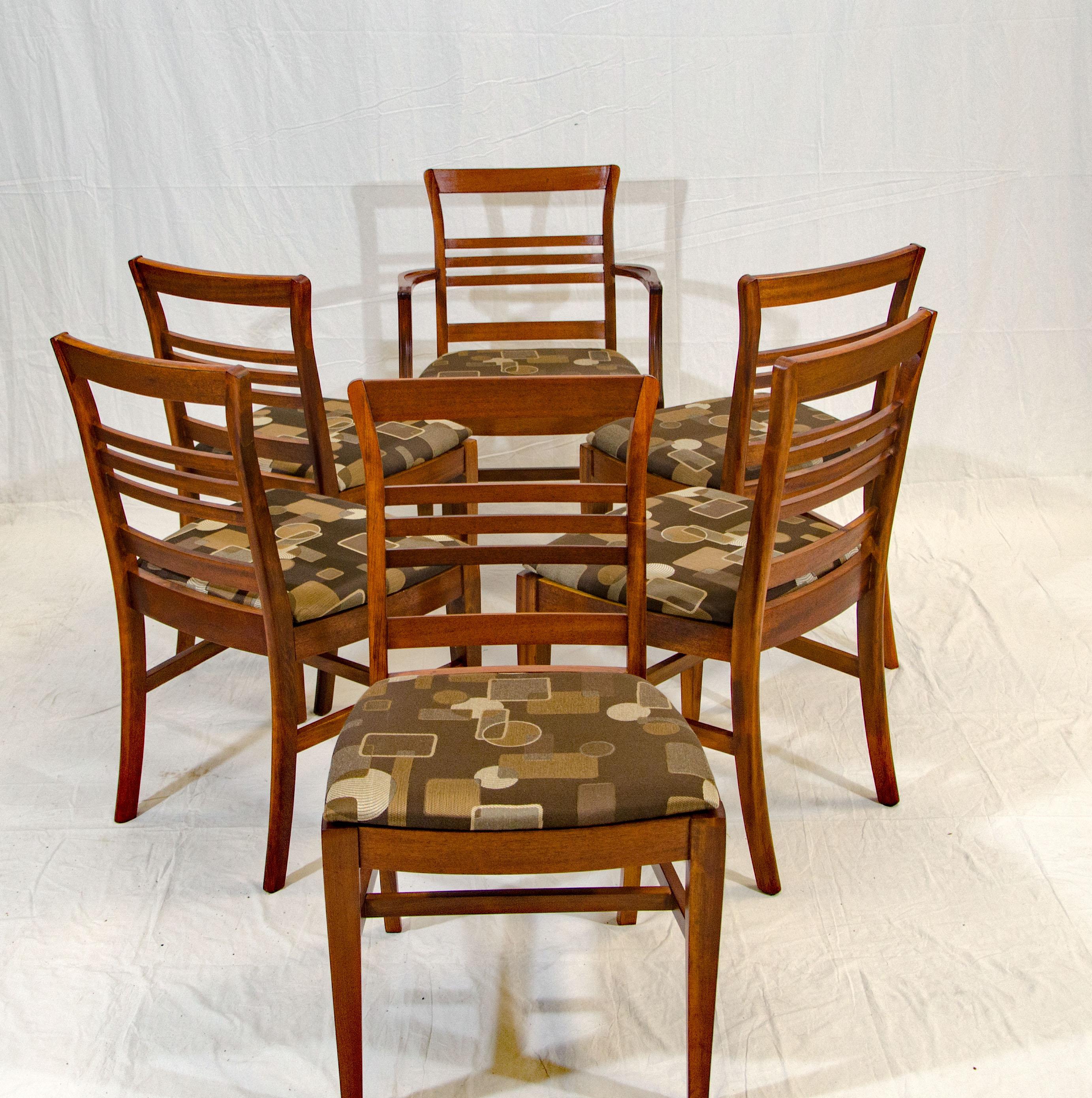 Nice set of six dining chairs that can pair with many styles of dining tables, including vintage teak of walnut. The mahogany is more of a brown tone and not the Duncan Phyfe red mahogany.
Armchair dimensions: 35 1/2