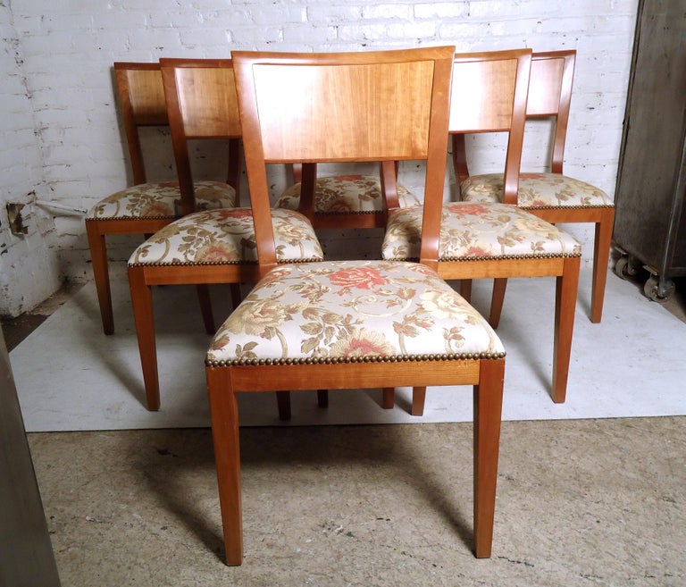Sleek set of six mid-century modern dining chairs featuring uniquely designed upholstered cushions.
(Please confirm item location - NY or NJ - with dealer).