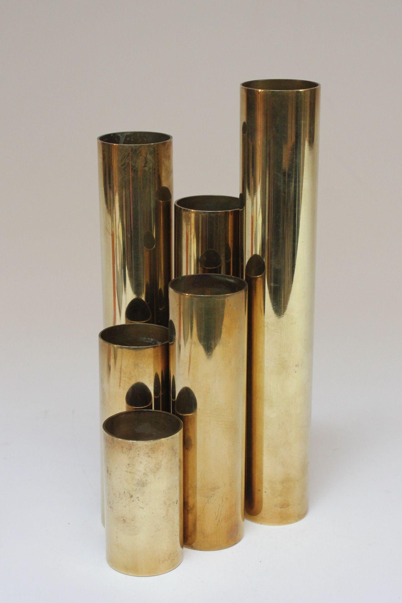Set of six American Modern brass candle holders in graduating heights (ca. 1970s).
Minimalist cylindrical form - attractive when displayed together as a candelabra cluster or spread out individually.
Reminiscent of a design by Gio Ponti, but