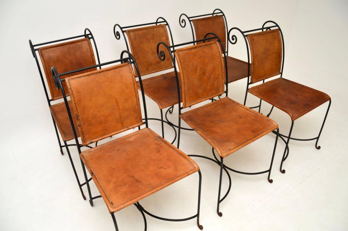 A gorgeous and very striking set of six vintage Spanish wrought iron and leather dining chairs, dating from around the 1970’s.

The quality is outstanding, they are extremely well made and they are very comfortable too. The wrought iron frames are