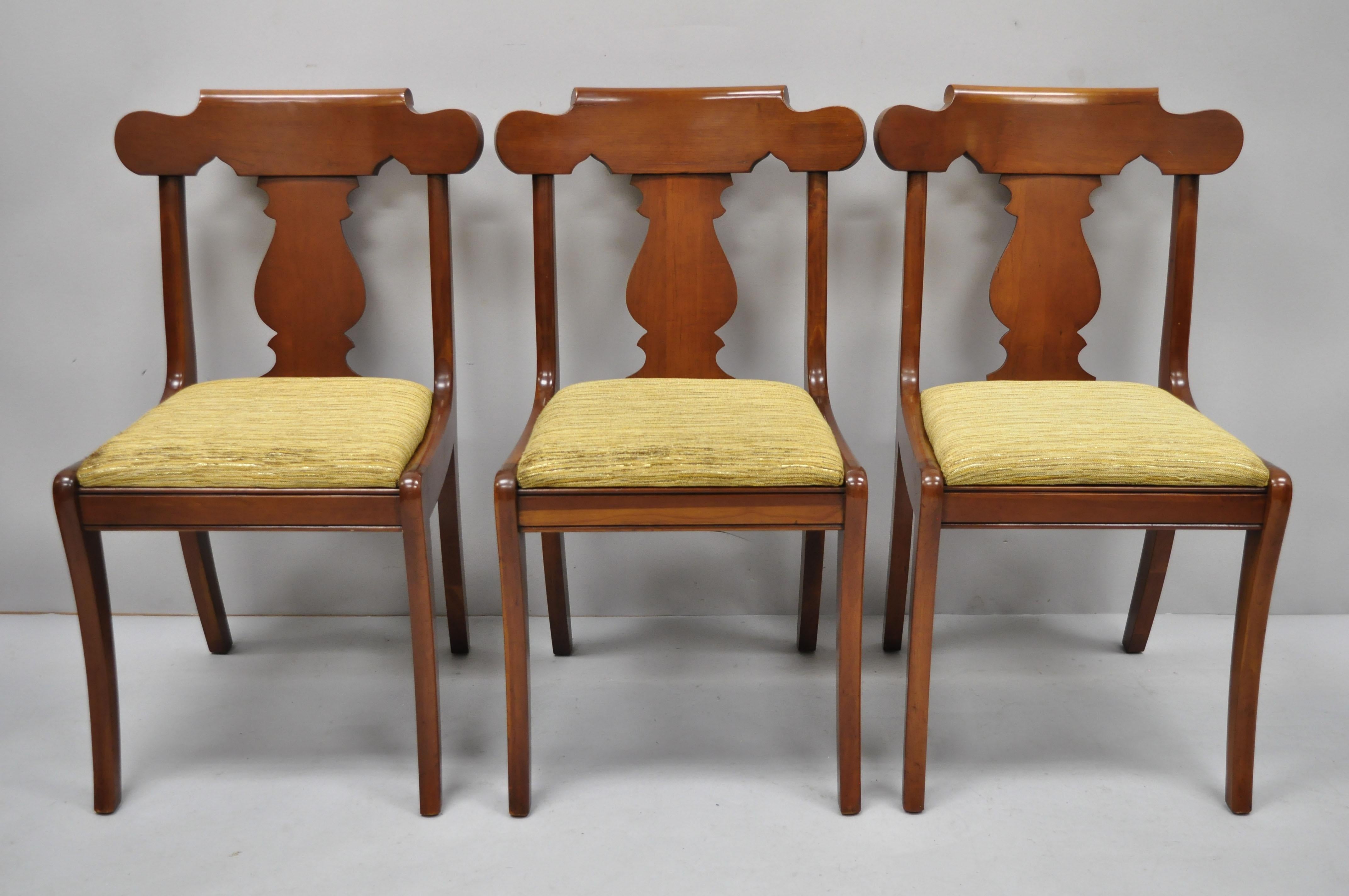 Set of six vintage Statton solid cherrywood American Colonial dining chairs. Listing includes (6) side chairs, solid wood construction, beautiful wood grain, original label, shapely saber legs, quality American craftsmanship, great style and form,