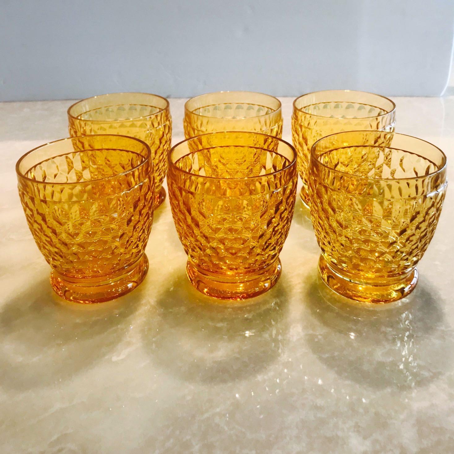 Set of six luxury crystal double old fashioned barware glasses from Villeroy & Boch's Boston series. The glasses are comprised of hobnail crystal with Classic diamond patterns and smooth rounded bases. In gorgeous amber colored crystal, making them