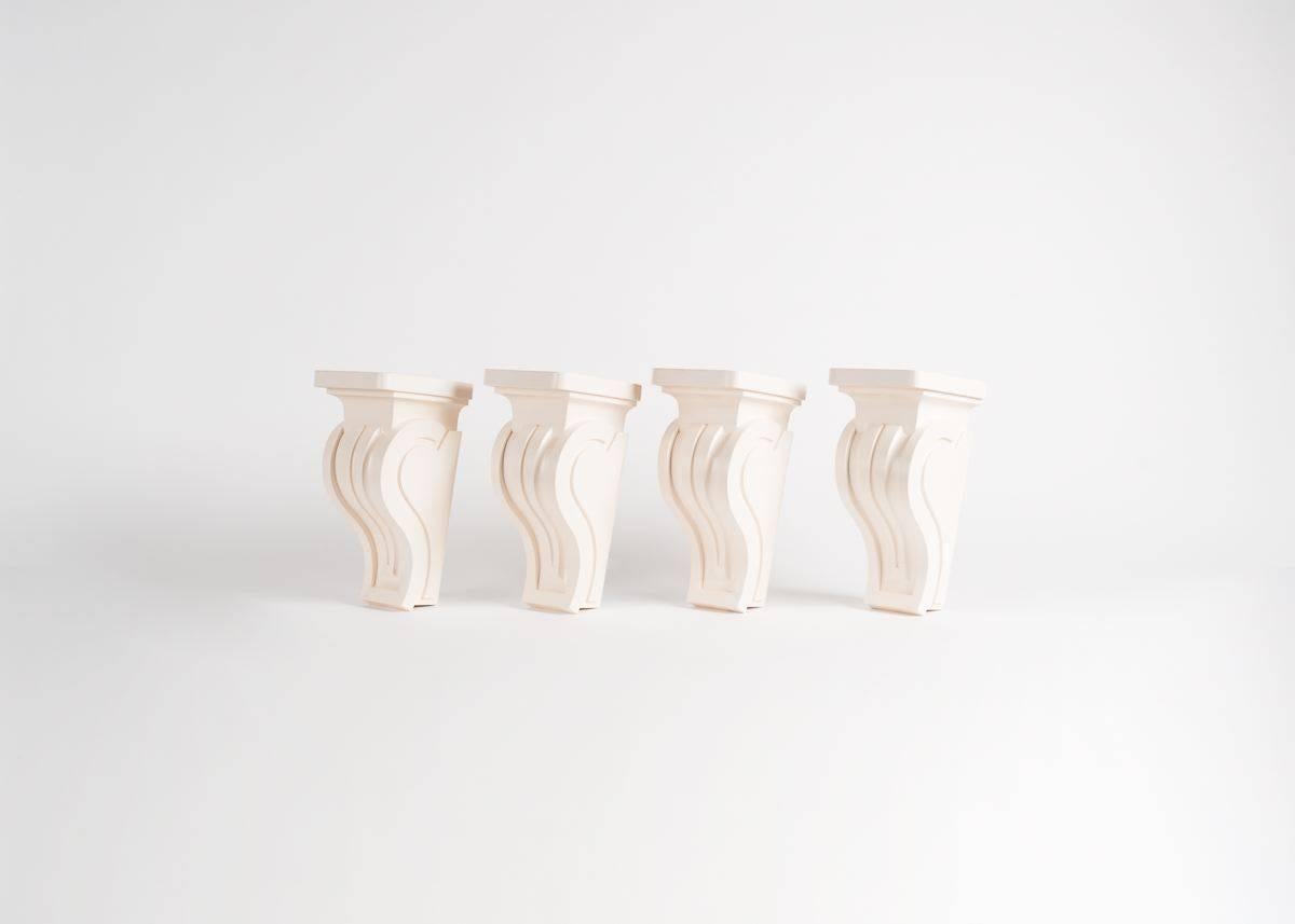 This set of wall-mounted pedestals in two sizes by famed midcentury designer Tommi Parzinger are marvelous architectural elements that serve aesthetic and functional ends alike. 

Four of a small size, two of larger size. Dimensions listed below
