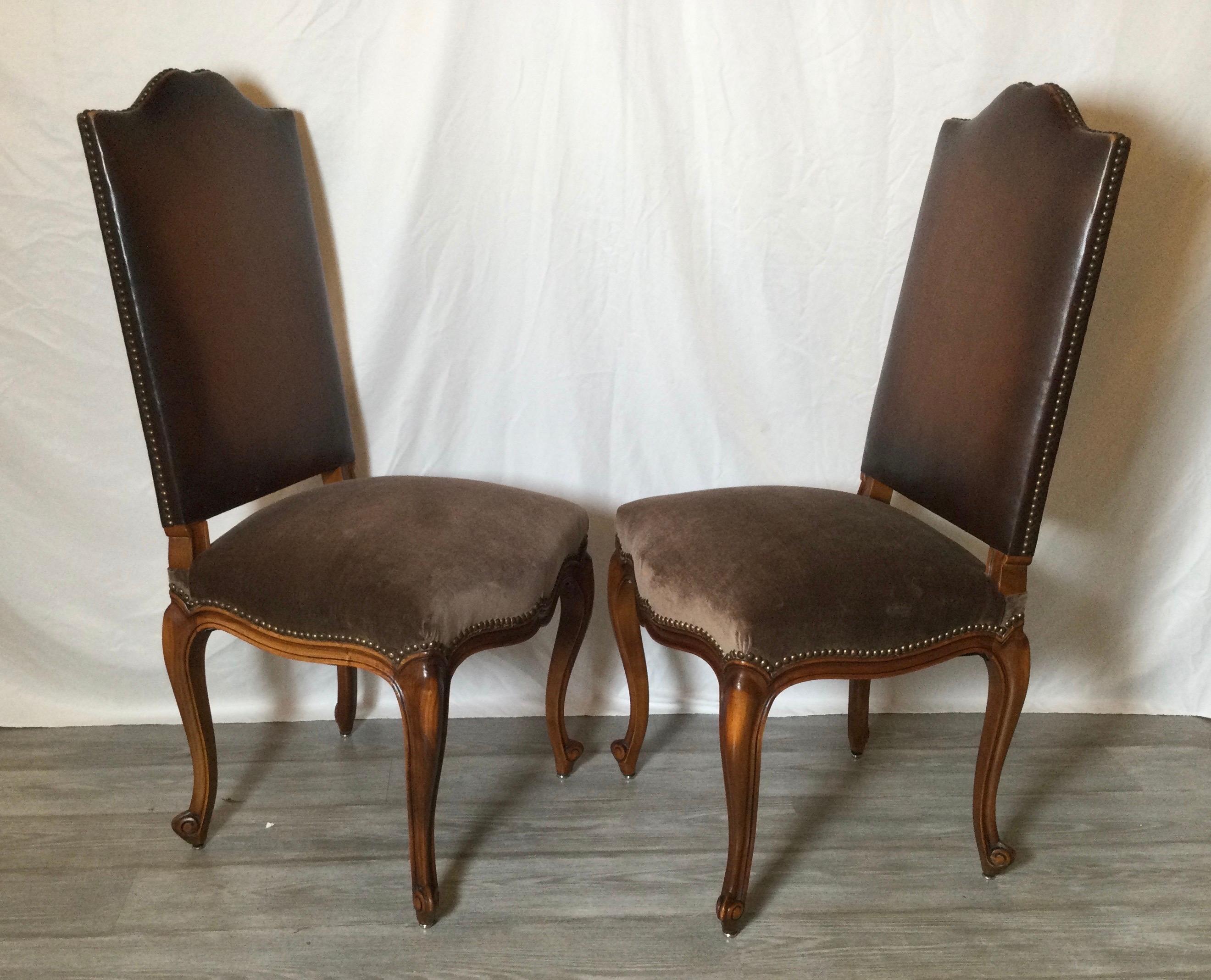 Set of six walnut country French chairs, brown leather back, brown velvet seats. 
Original leather backs with brass tacks and new brown velvet upholstery on the seats.
Dimensions: