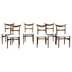 Set of six walnut Lübke dining chairs