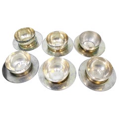 Set of six washbasins and plates in hammered silver