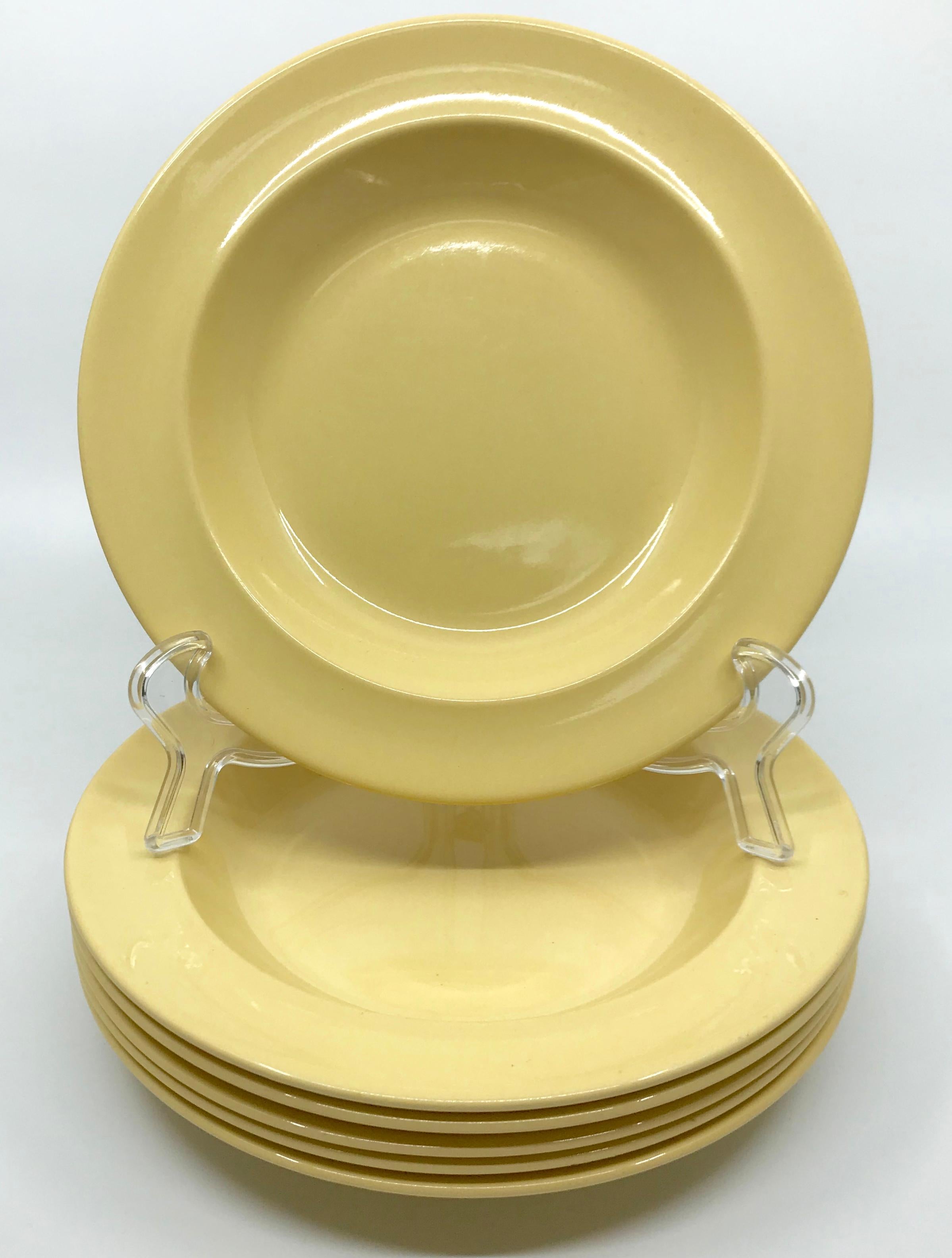 Set of six Wedgwood yellow plates. Six vintage creamware shallow bowls/plates in 