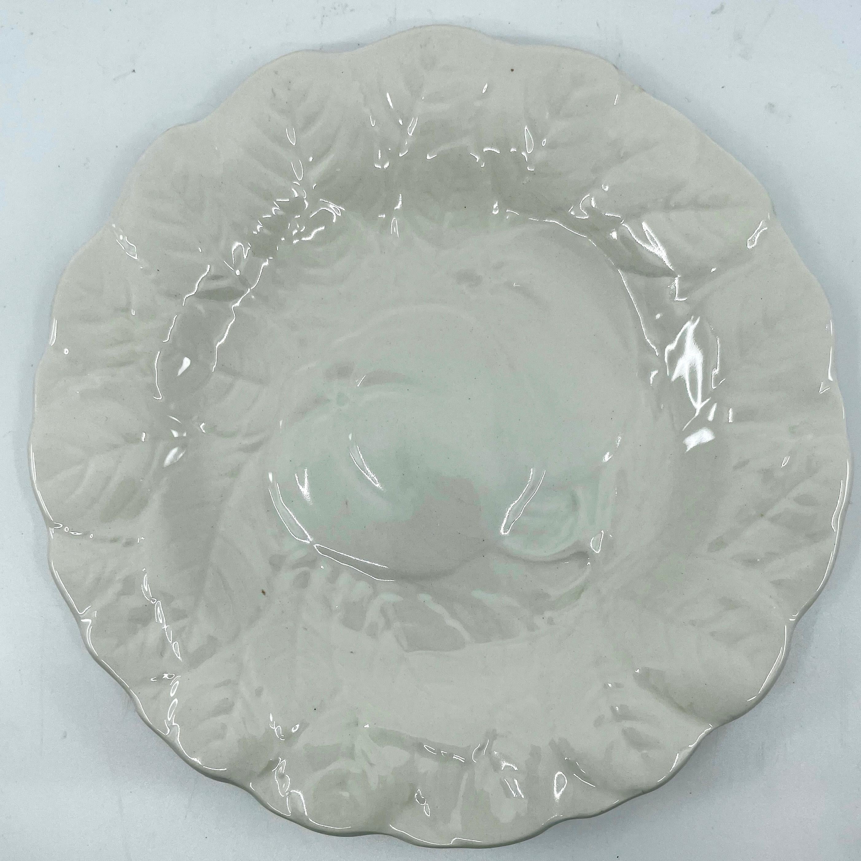 Set of six white fruit salad dessert plates. Vintage white plates each different fruit and different leaf-shaped edge according to its fruit. Strawberry, grape, plum, persimmon, cherry and pear. France, mid twentieth century Dimensions: 7.75”