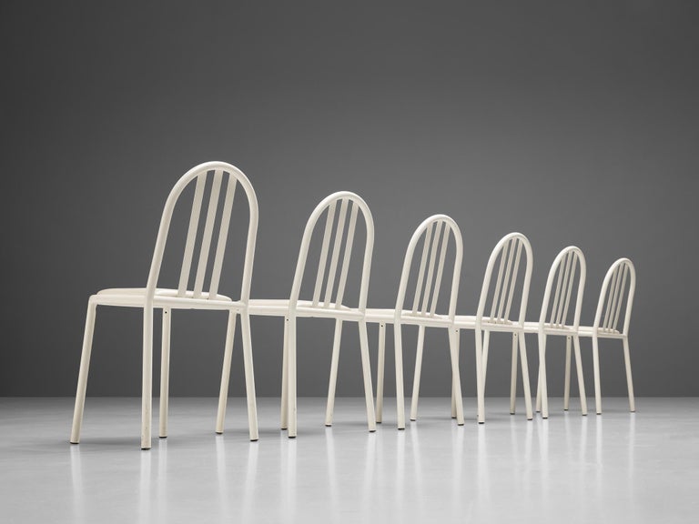 Robert Mallet Stevens for Stevens designs, set of 6 dining chairs, lacquered metal and leatherette, France, design 1928, production later.

Set of white lacquered tubular chairs designed by the one of the masters of the Modern architecture; French