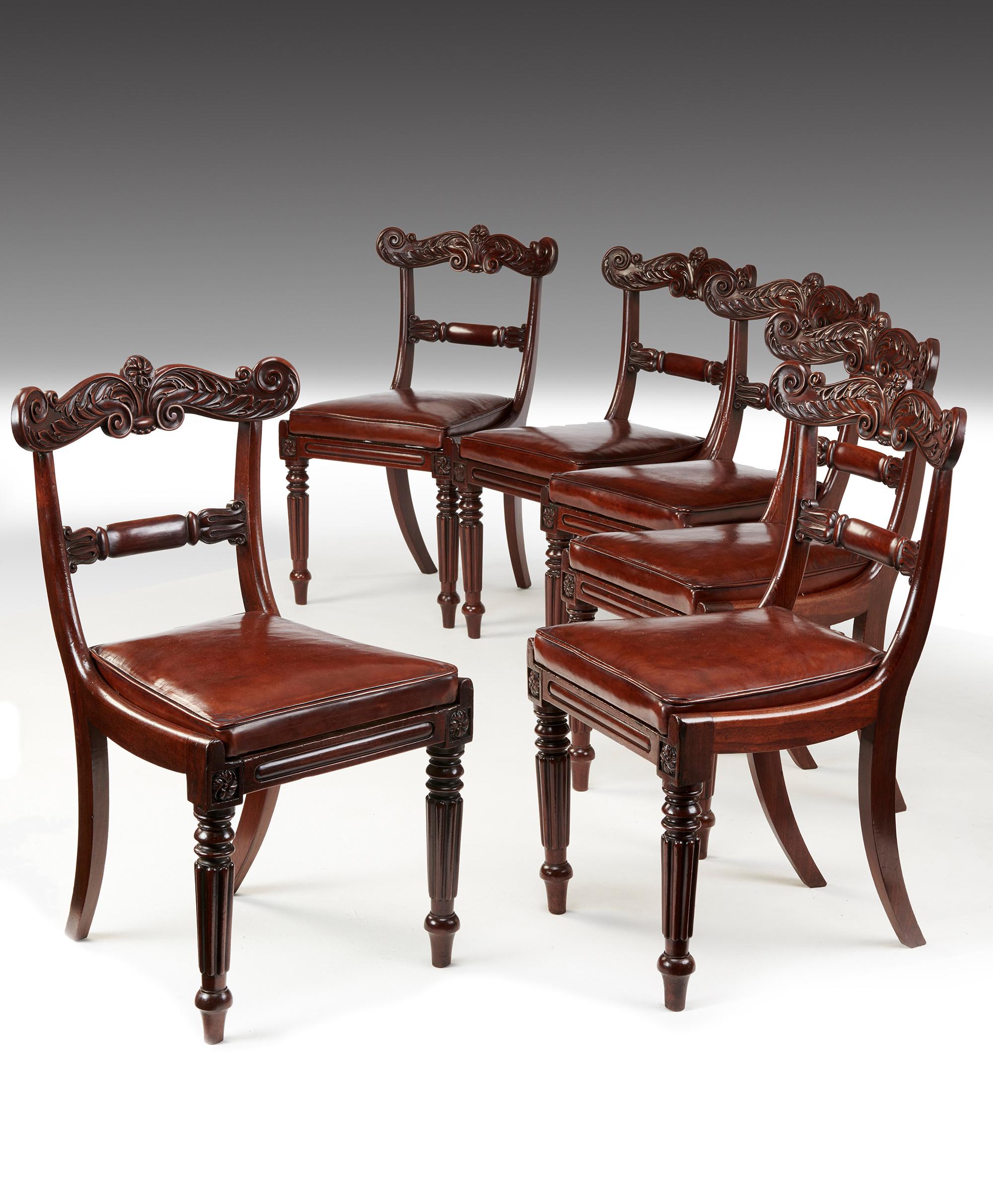 A fine set of six William IV mahogany dining chairs with leather drop in squab seats.

English, circa 1830.

Overall of elegant design and constructed from a fine choice of mahogany, the scrolled top rail finely carved with acanthus leaf design