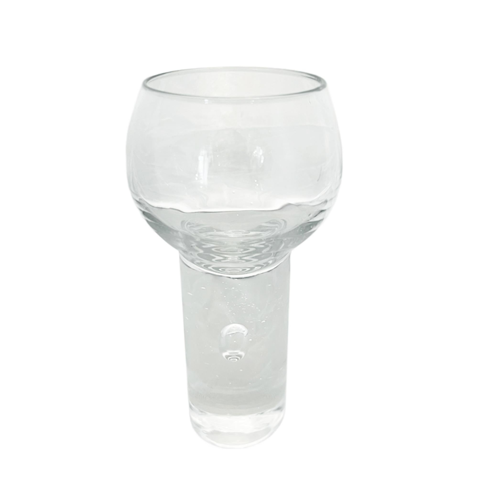 A great set of 6 wine glasses, made in Italy in the 1960s. 

Handmade - all the glasses have intention bubbles in the bases, making each unique, even though they are part of a uniform set. 
One glass is slightly scratched, there are no chips.

A