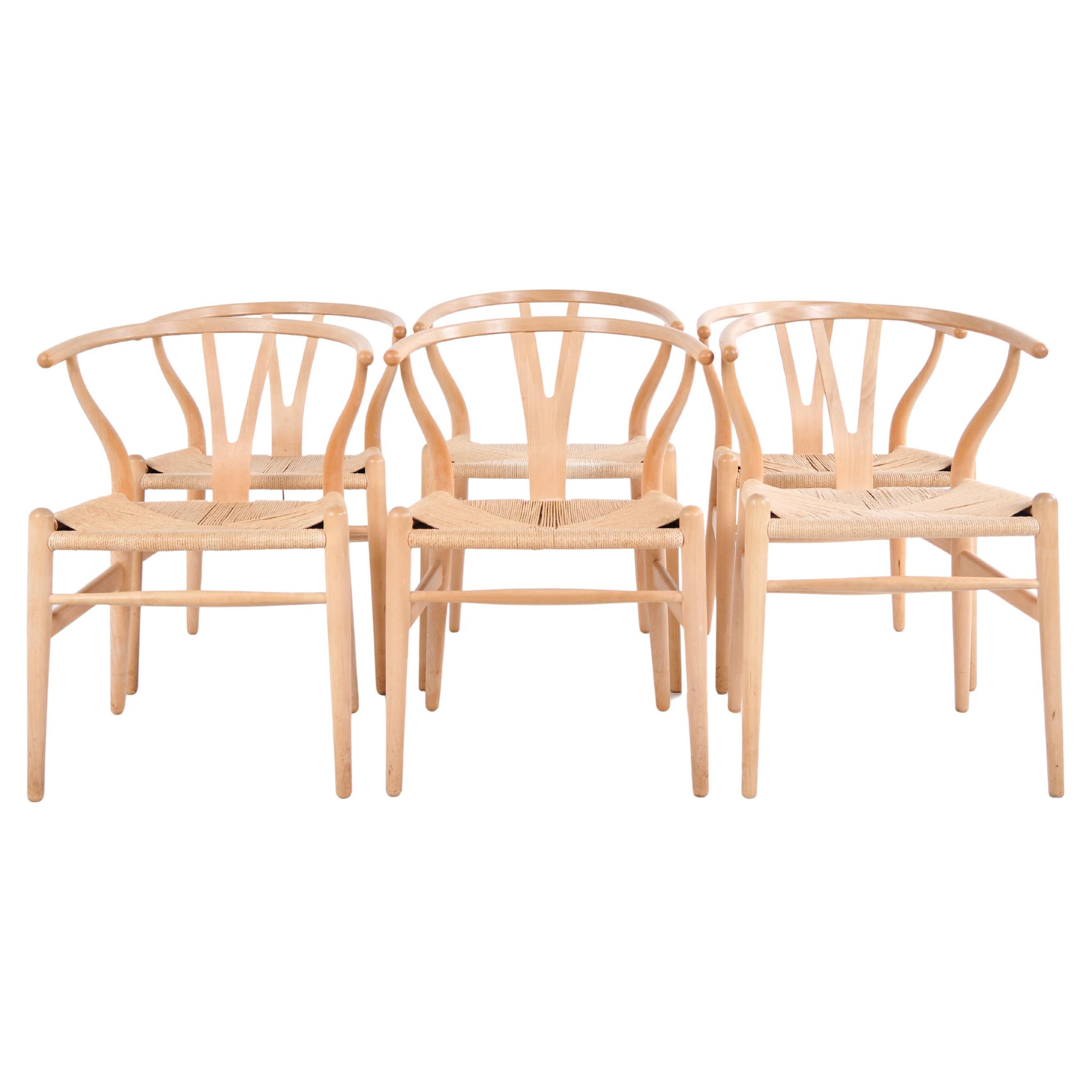 Set Of Six Wishbone chairs Model CH24 In Beech 
Natural Cord By Hans J. Wegner