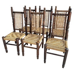 Ensemble de six chaises de salle à manger en bois et corde de style Audoux et Minet, France, années 1950