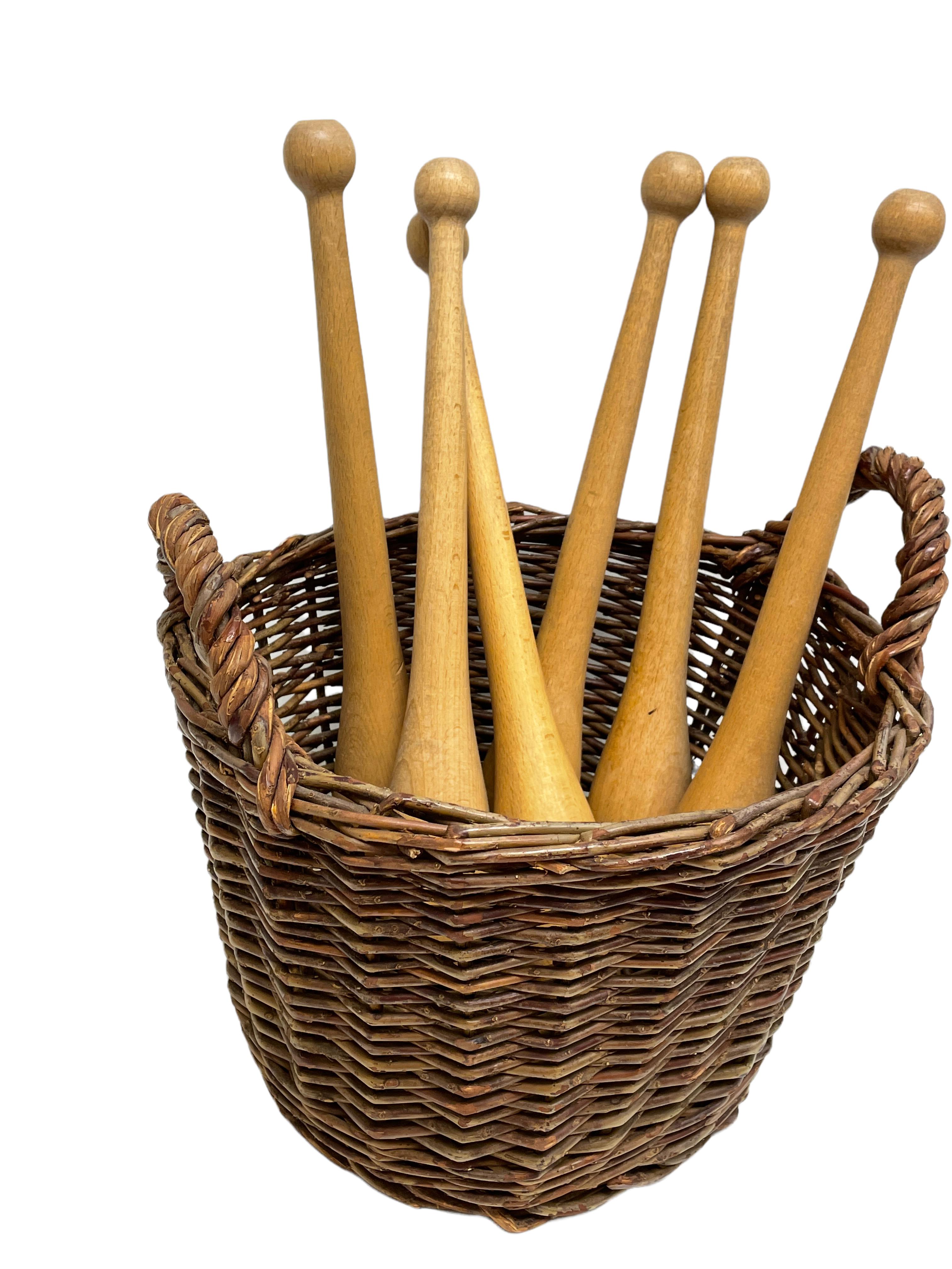 Mid-20th Century Set of Six wooden Gymnastic Clubs, with Storage Wicker Basket, Vintage German For Sale