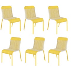 Set of Six Yellow Resin Stackable Chairs